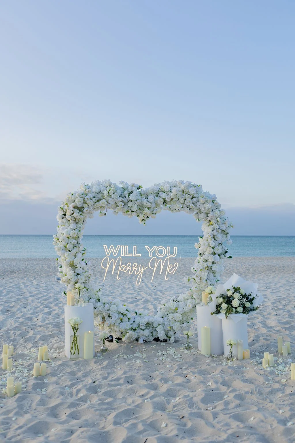 Melbourne Beach Proposal with white floral heart