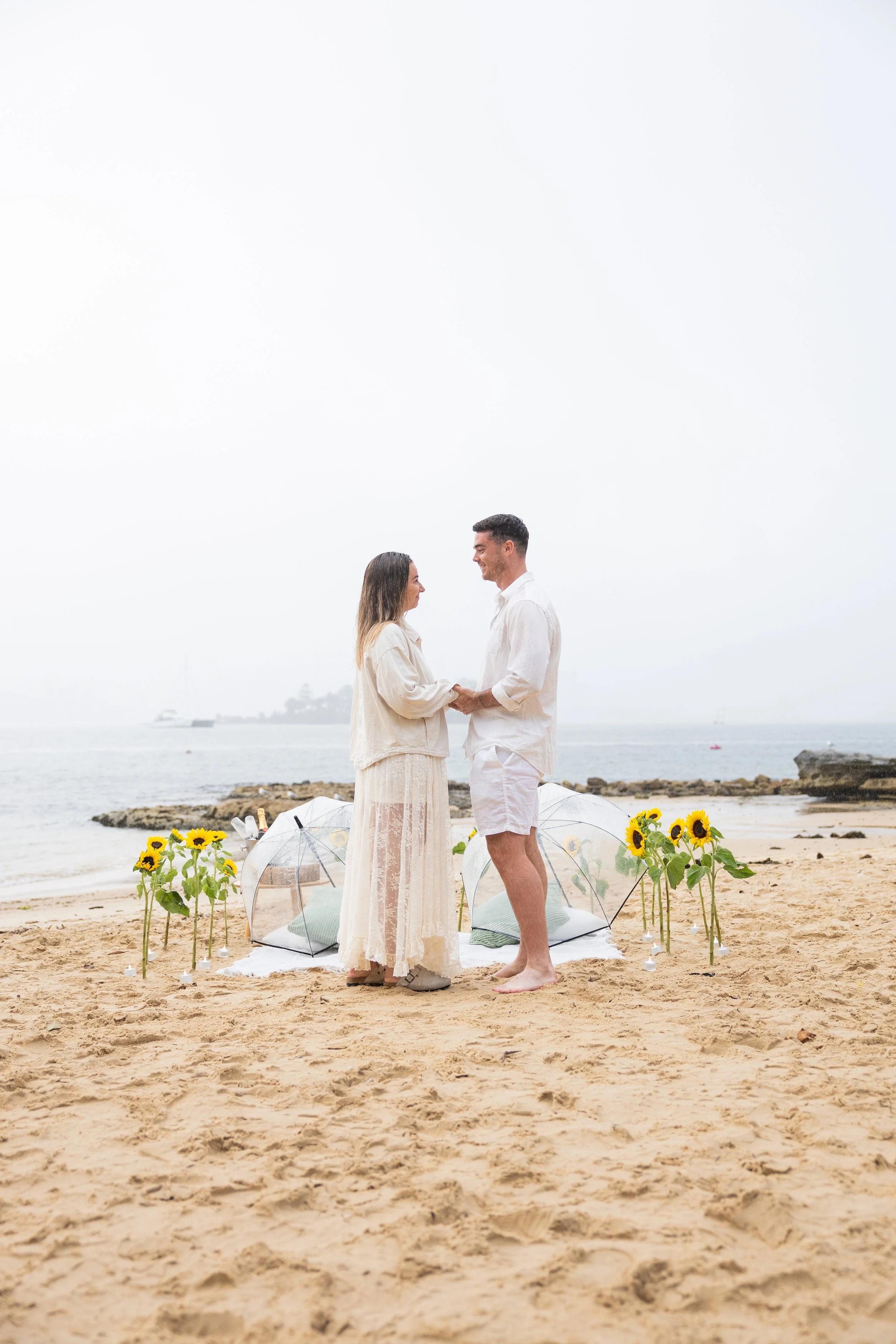 Private simple beach proposal at Milk Beach in Sydney captured by proposal photographer 