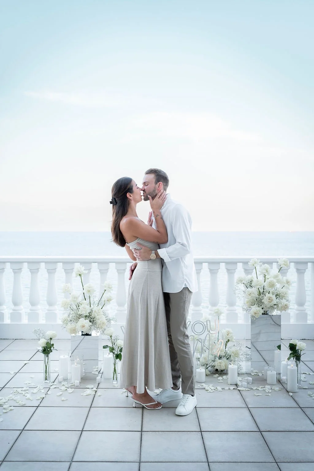 A Villa Gail Cairns proposal setup with candles and roses luxury villa