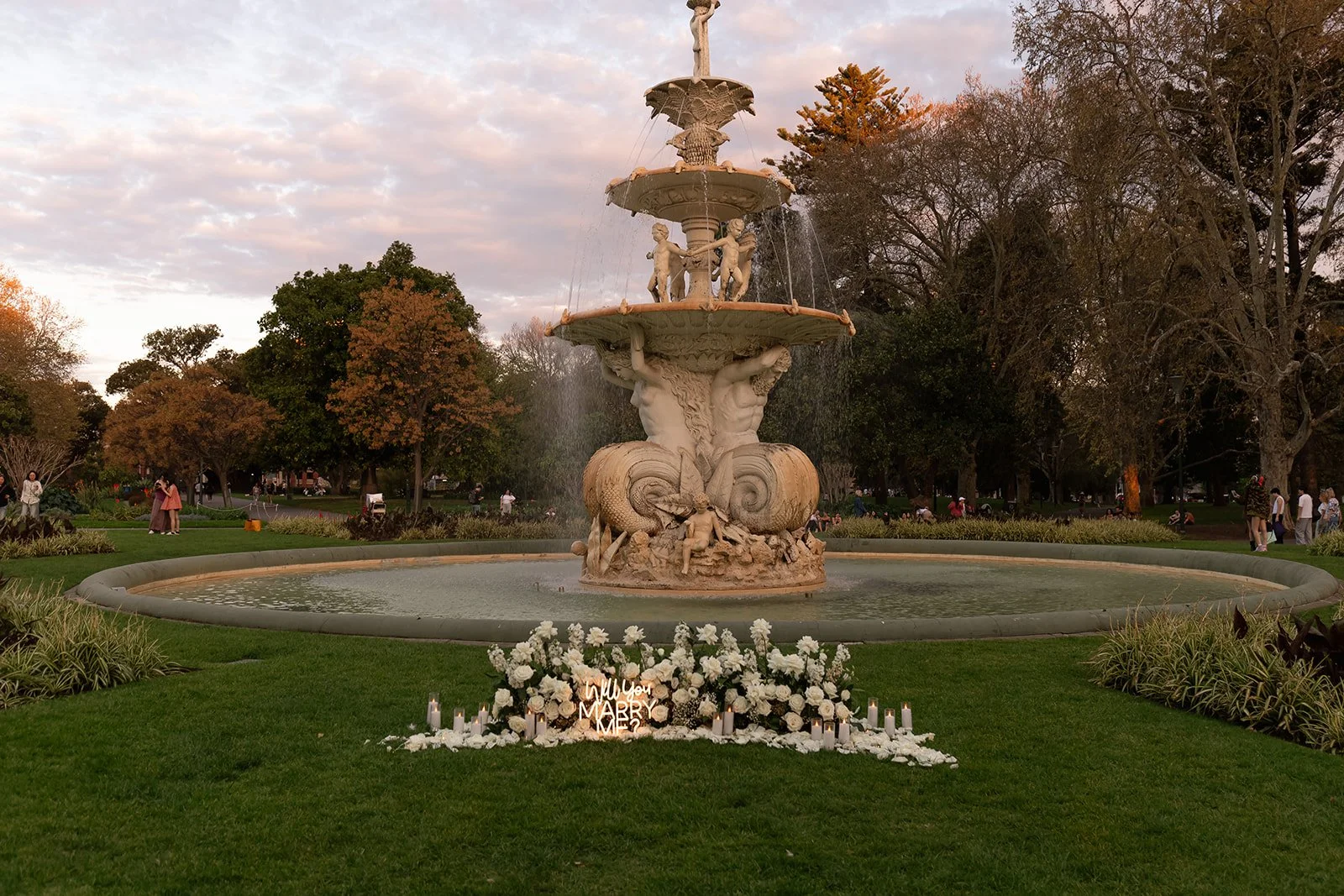 Romantic proposal at the Carlton Gardens fountain in Melbourne