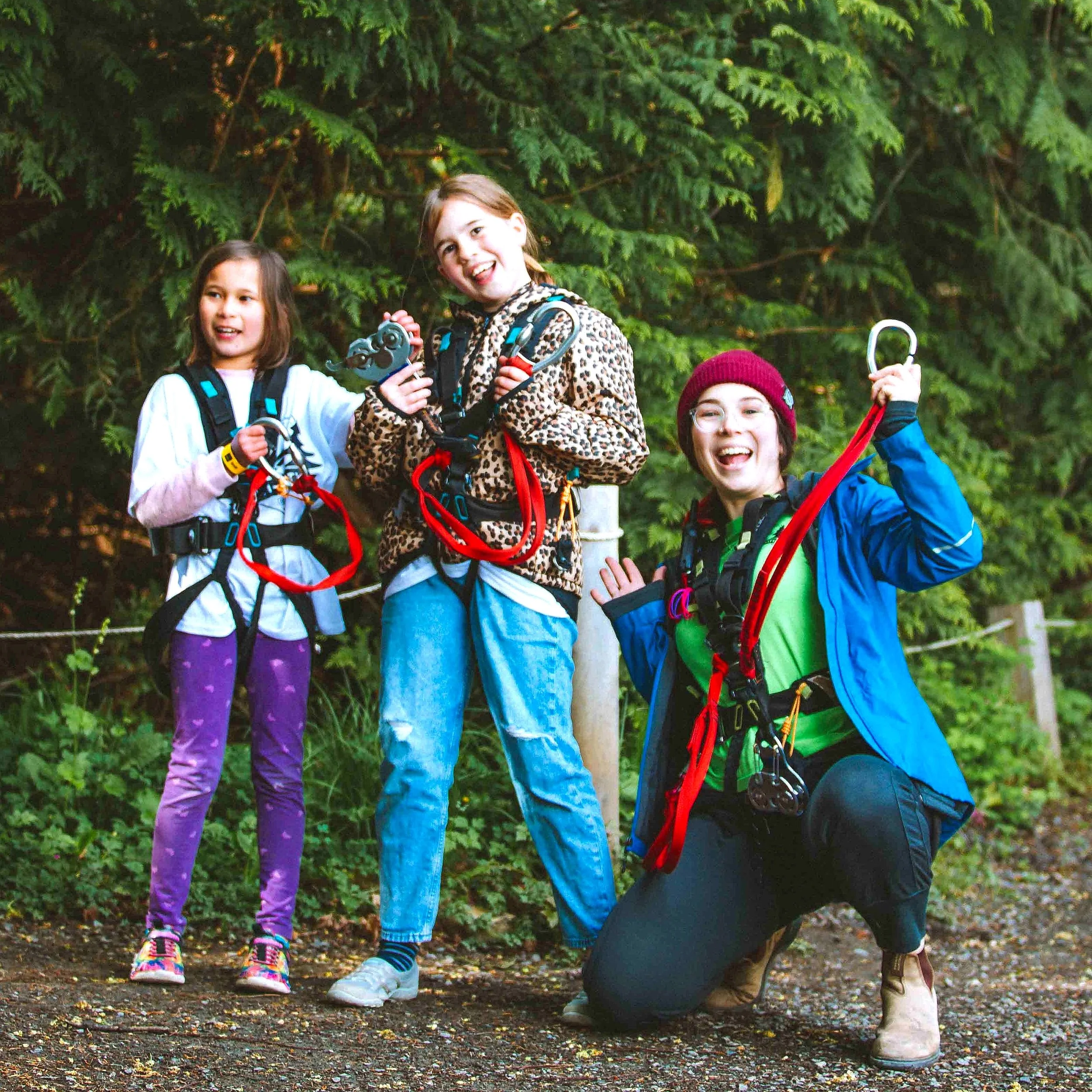 Kids in safety harness ready to adventure at WildPlay Nanaimo an Outdoor Adventure Park on Vancouver Island