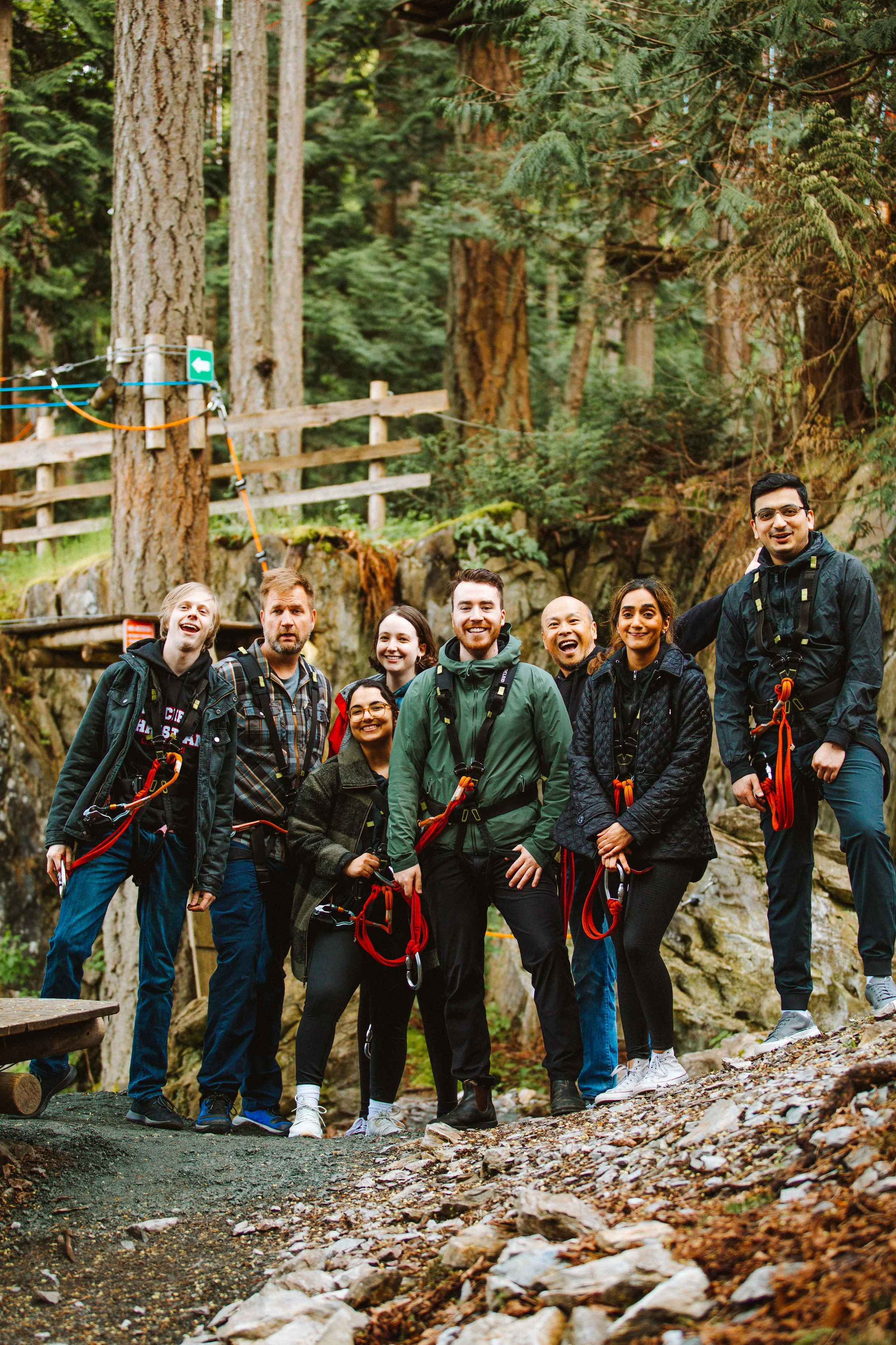 Group of guests smiling during their adventure at WildPlay outdoor adventure park in British Columbia. 