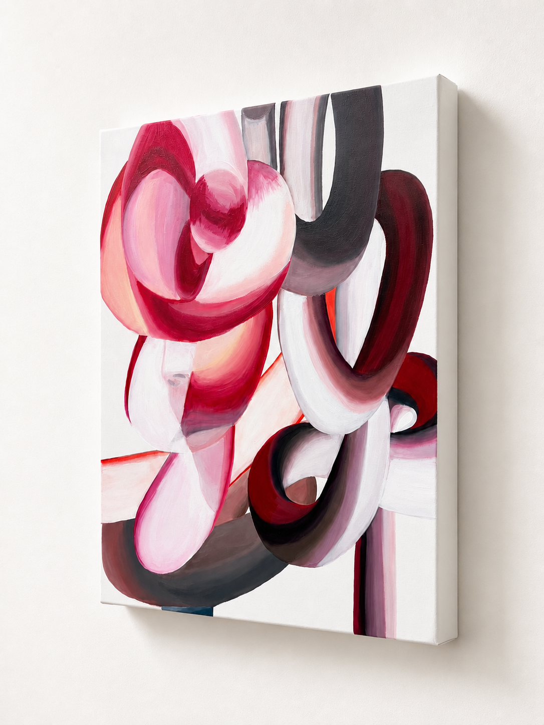 Abstract painting with intertwined loops and swirls in shades of pink, red, black, white, and gray against a white background.