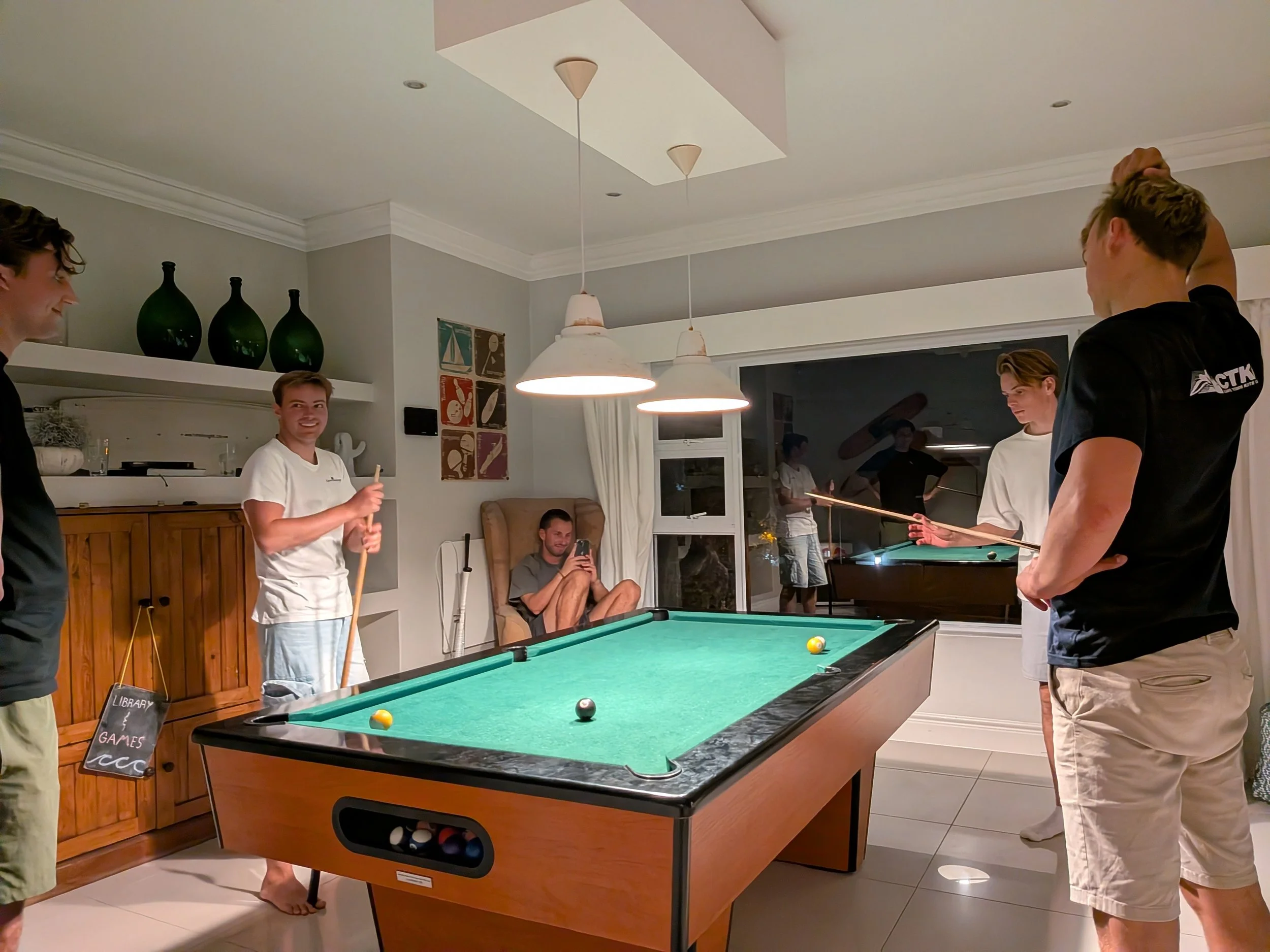Playing pool at the club