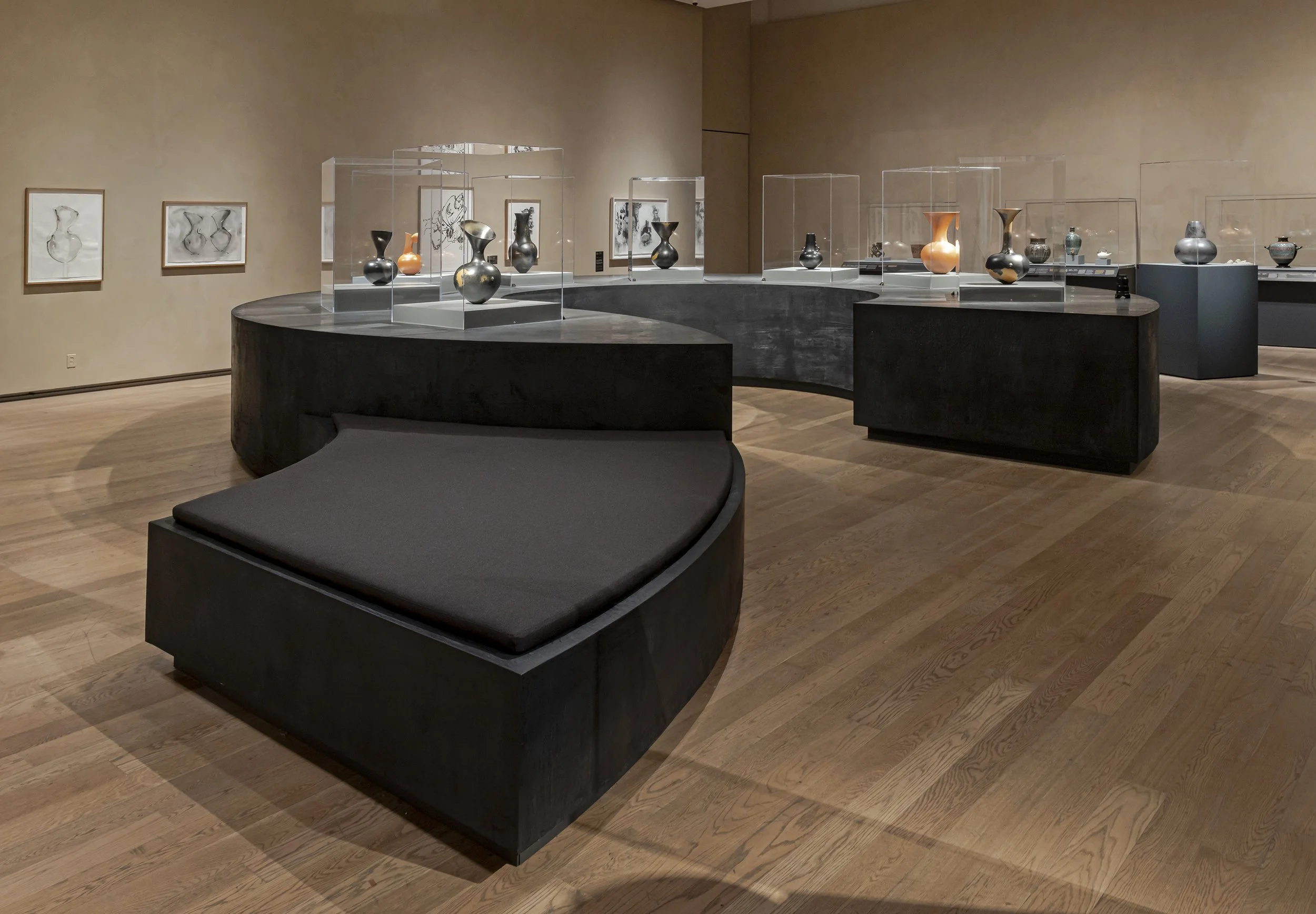 Circular plinths and seating as part of Magdalene Odundo Exhibition designed by SOCA. Photography credits to Toni Hakenscheid