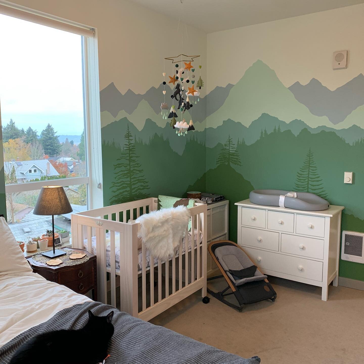 With the addition of her amazing handmade mobile yesterday, my nursery collaboration with @darlingdarkness is shaping up pretty nicely. Stoked to share some progress shots. Definitely been a while since I painted and it&rsquo;s been oddly meditative.