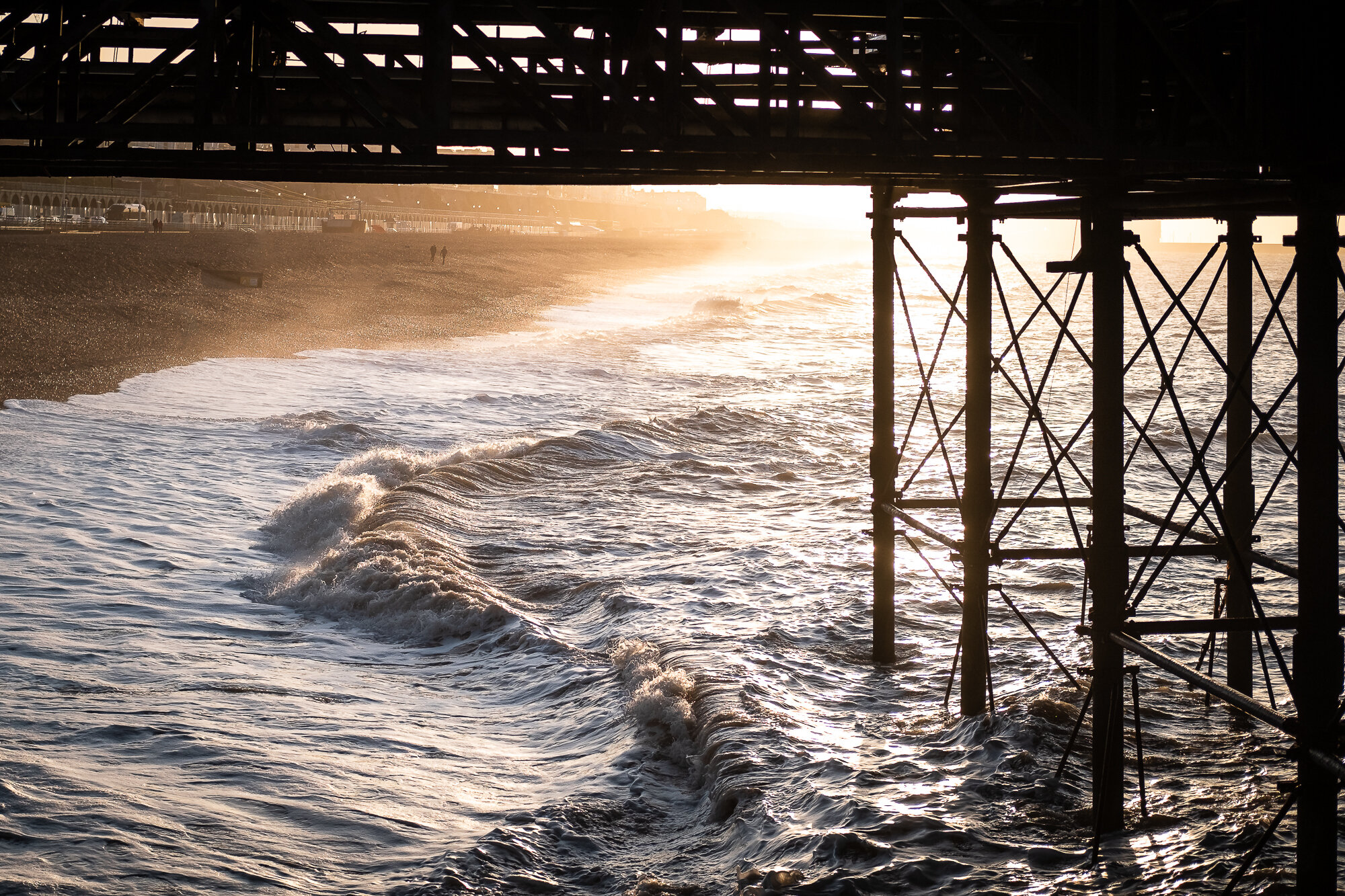 The view under Palace Pier in Brighton at sunrise by Trevor Sherwin