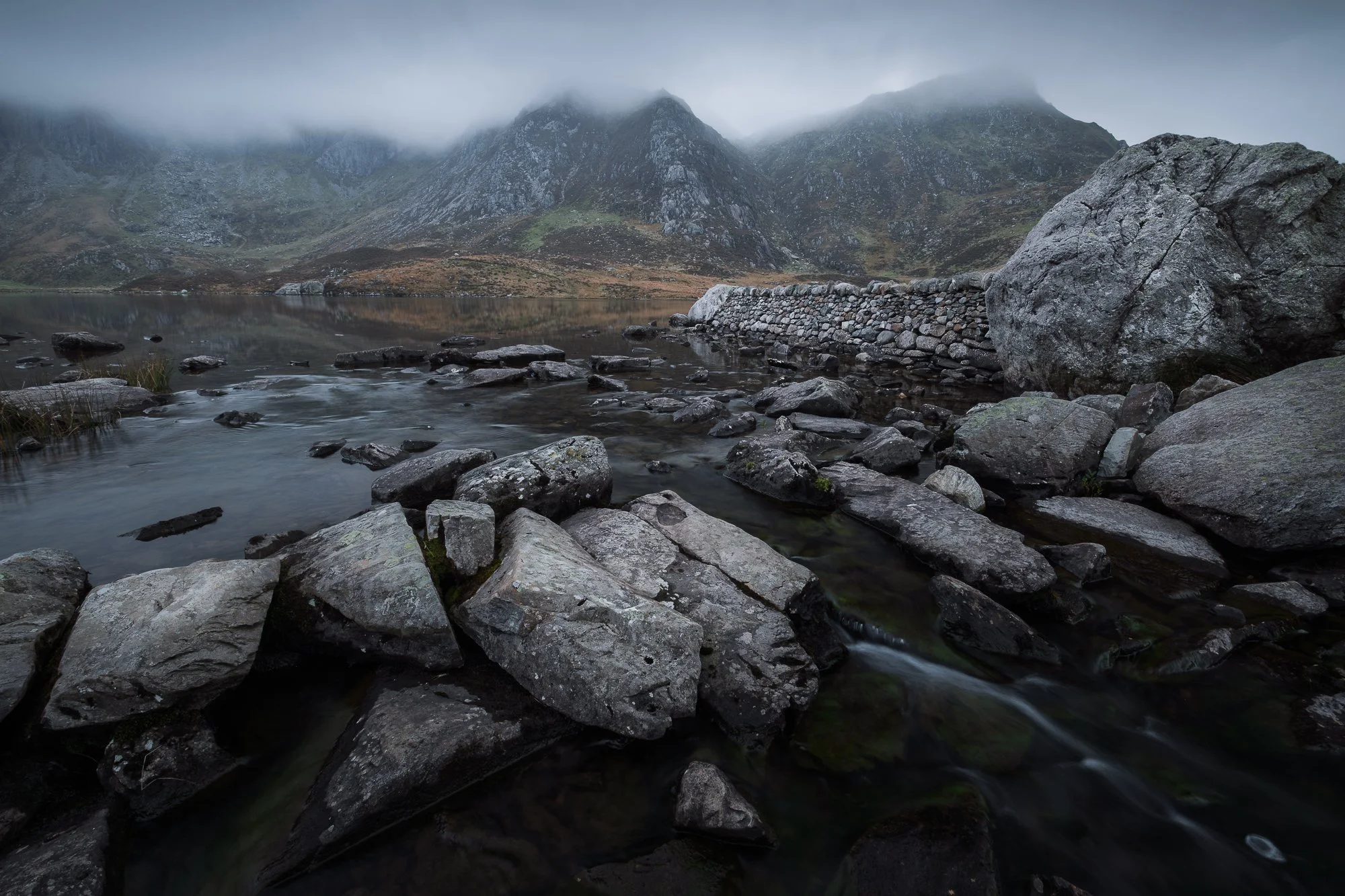 A landscape photo of Llyn Idwal in the Ogwen Valley taken in cloudy conditions by Trevor Sherwin