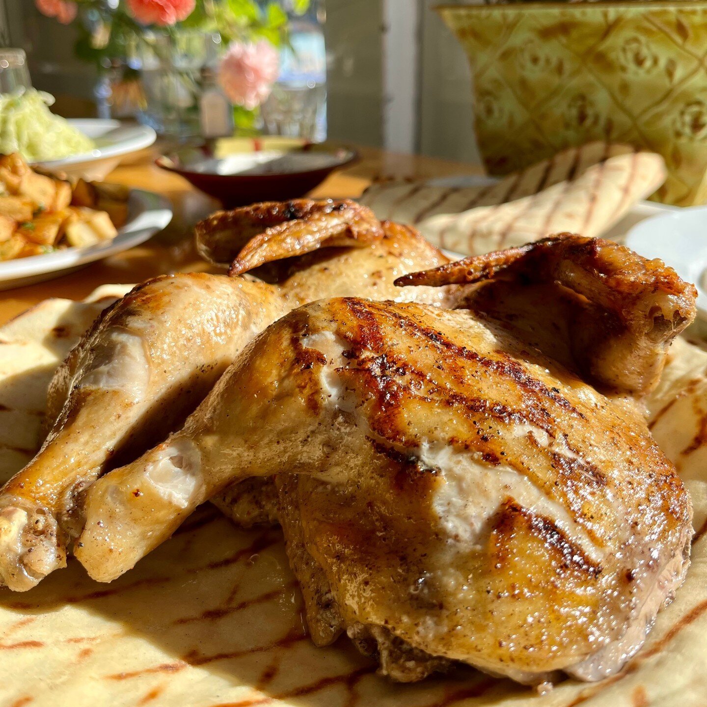 Happiness is our Lebanese lemon chicken meal! We're absolutely OBSESSED! Juicy chicken rubbed in a lemon garlic marinade served with signature cabbage salad, batata harra,  hummus, pita and toum. Who's hungry?