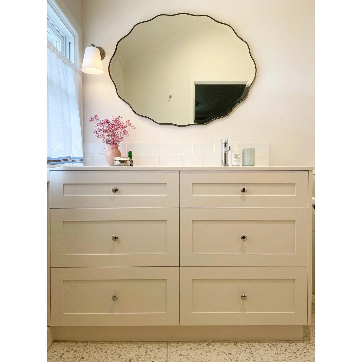 Warm toned Italian terrazzo tiles and a sweet scalloped edge mirror add texture and interest to this ensuite in my recent Hendra project. 

With couple of additional bathroom plans on the go at the moment, I&rsquo;m looking forward to incorporating s