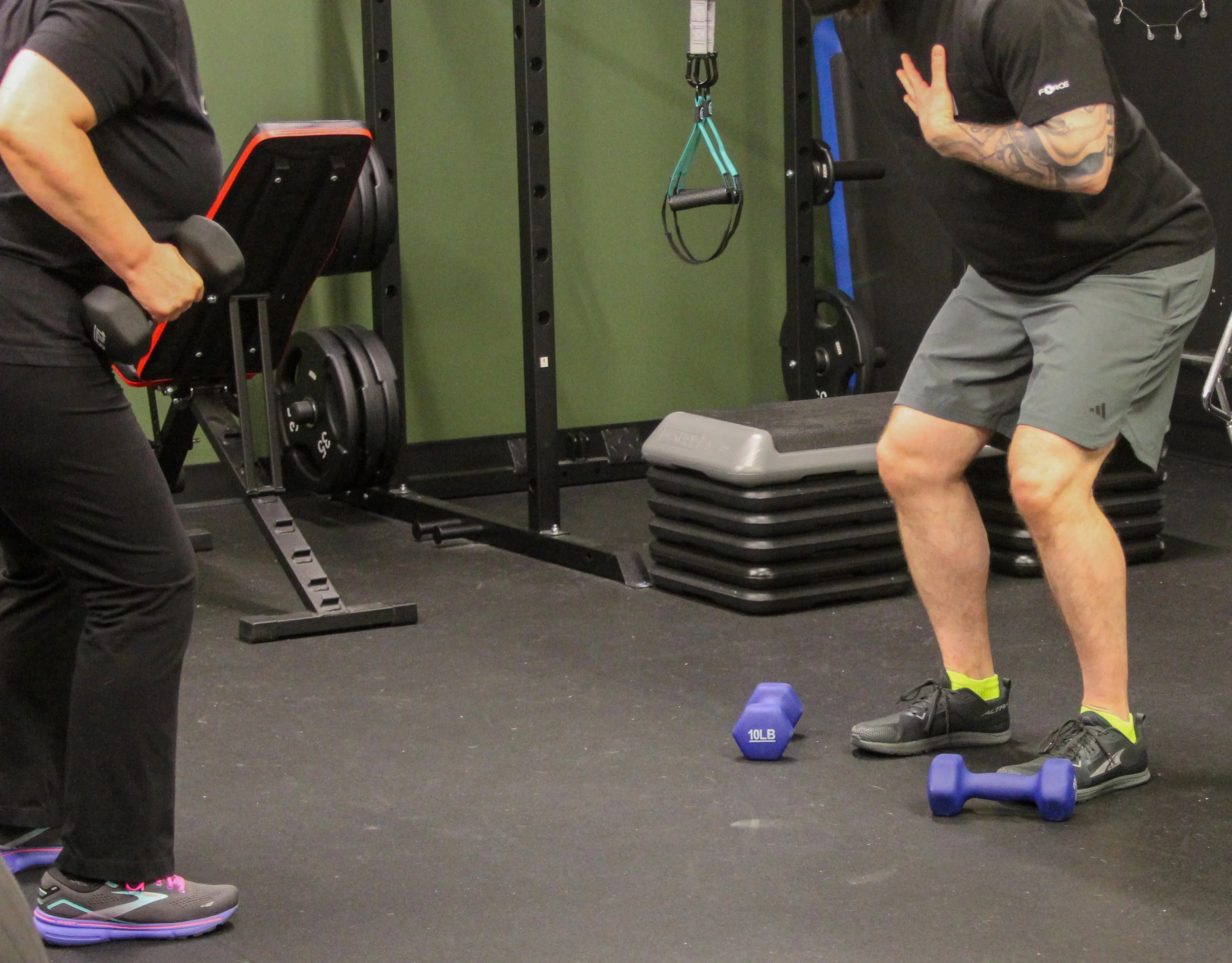 NASM certified trainer working an elderly person on form
