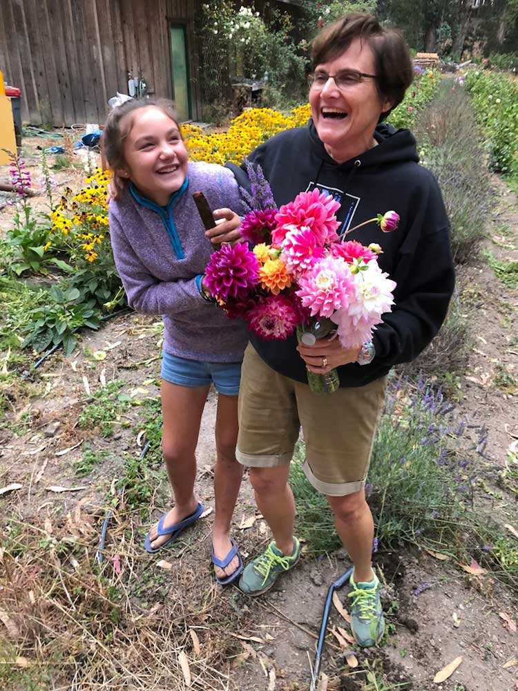 Mary-and-jen-flowersrsv trees pumpkin organic farm food donations santa cruz half moon bay pescadero.jpg