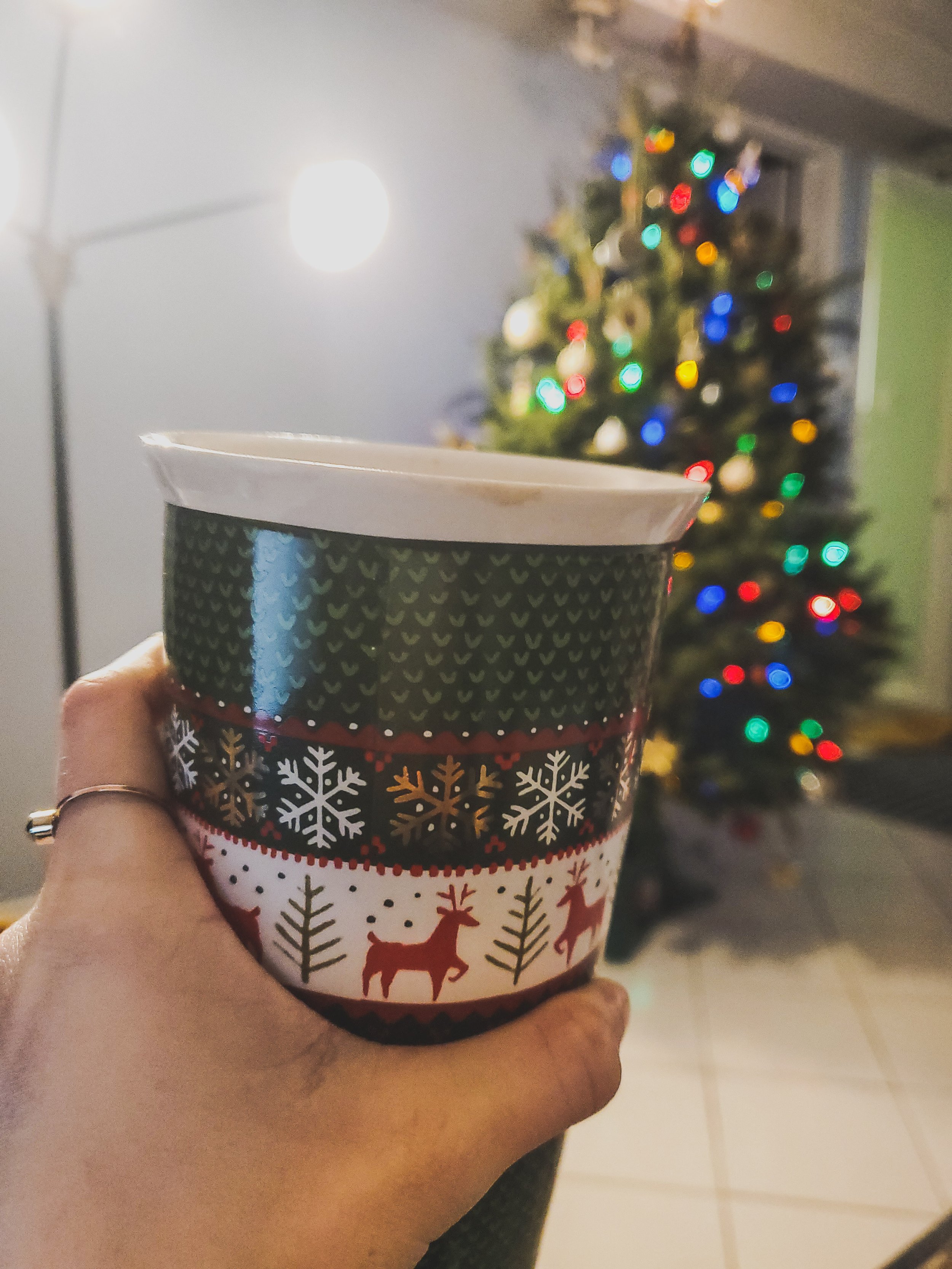  Prepping for an intense therapy session with a homemade mocha in a Christmas mug. 