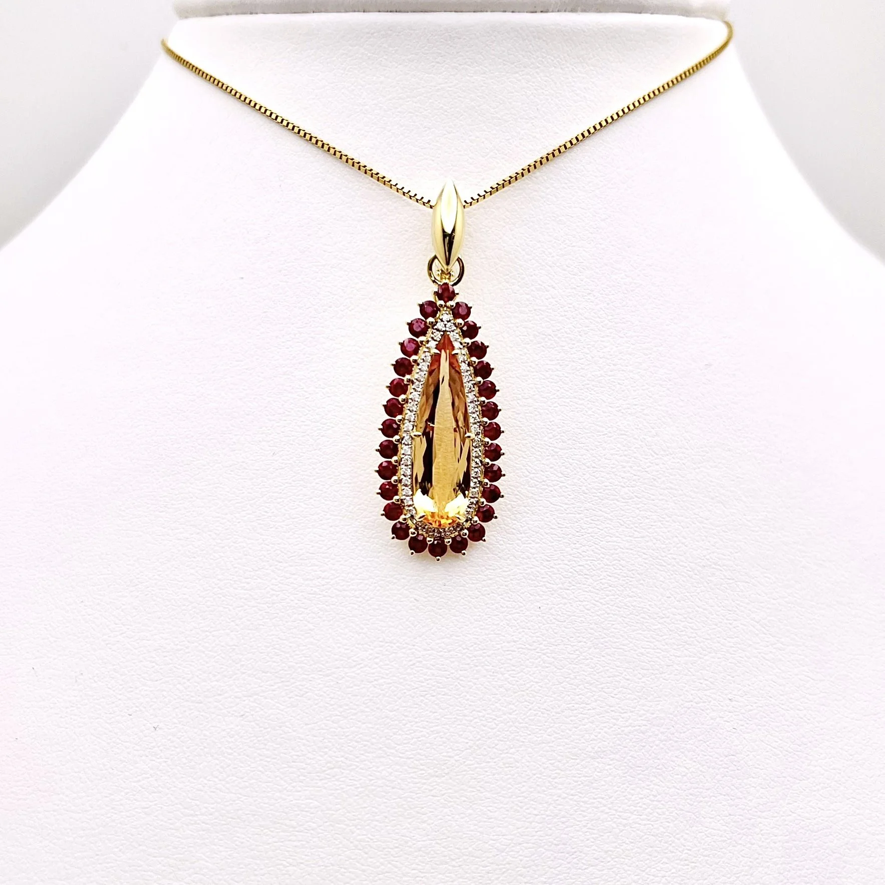 18 karat yellow gold Imperial Topaz with Rubies and Diamonds pendant