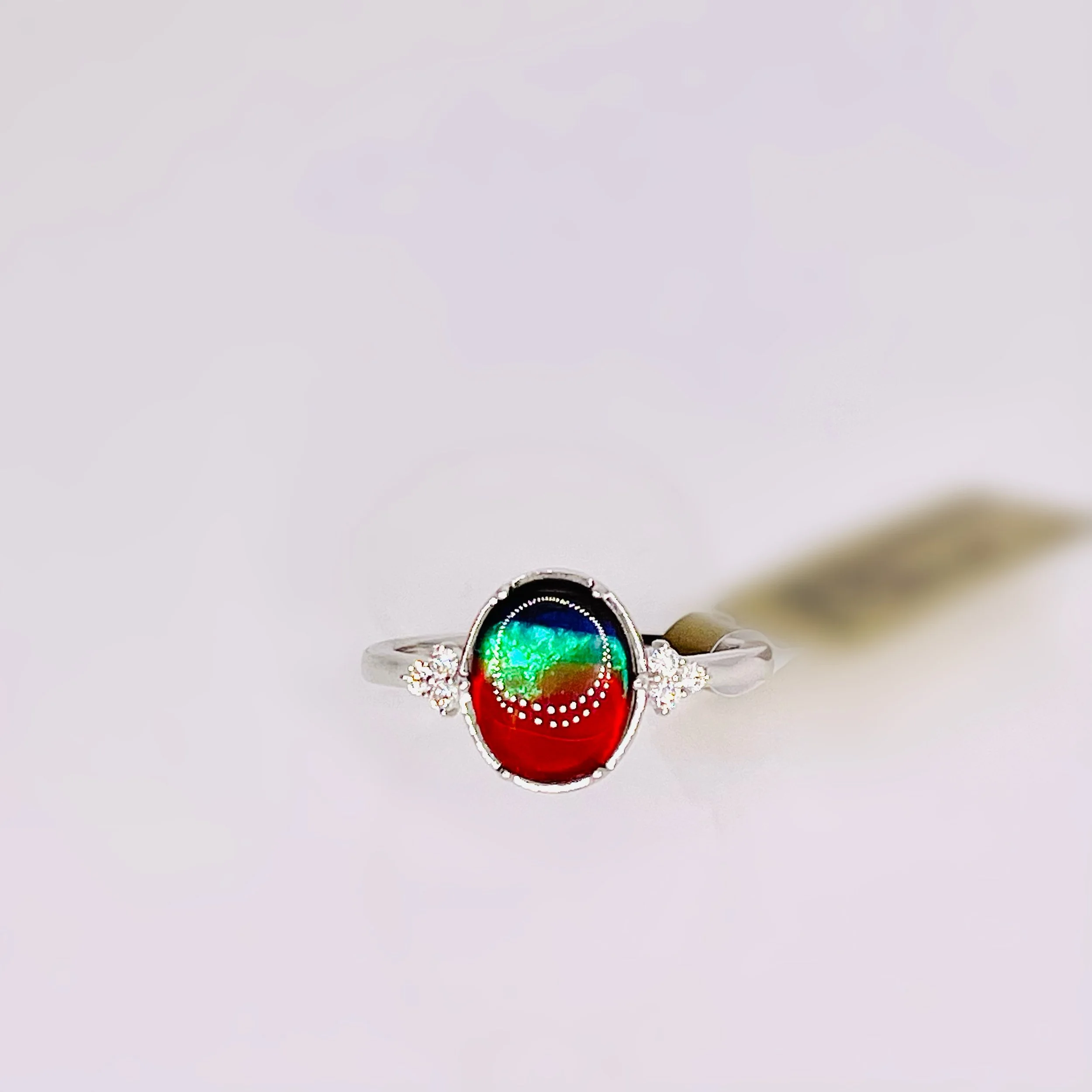 18 karat white gold Ammolite ring with Diamonds