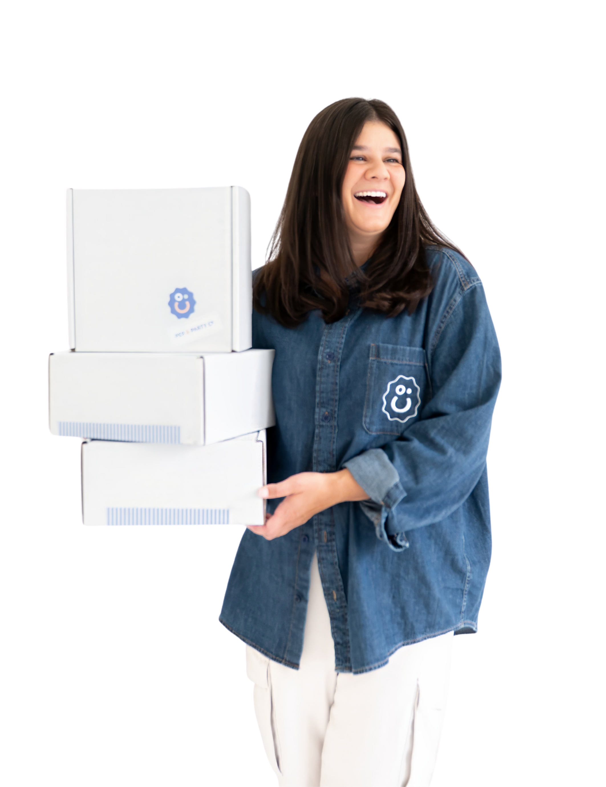 Annie Bradshaw smiling while holding custom gift boxes for Pep & Party Co. gifting experiences.