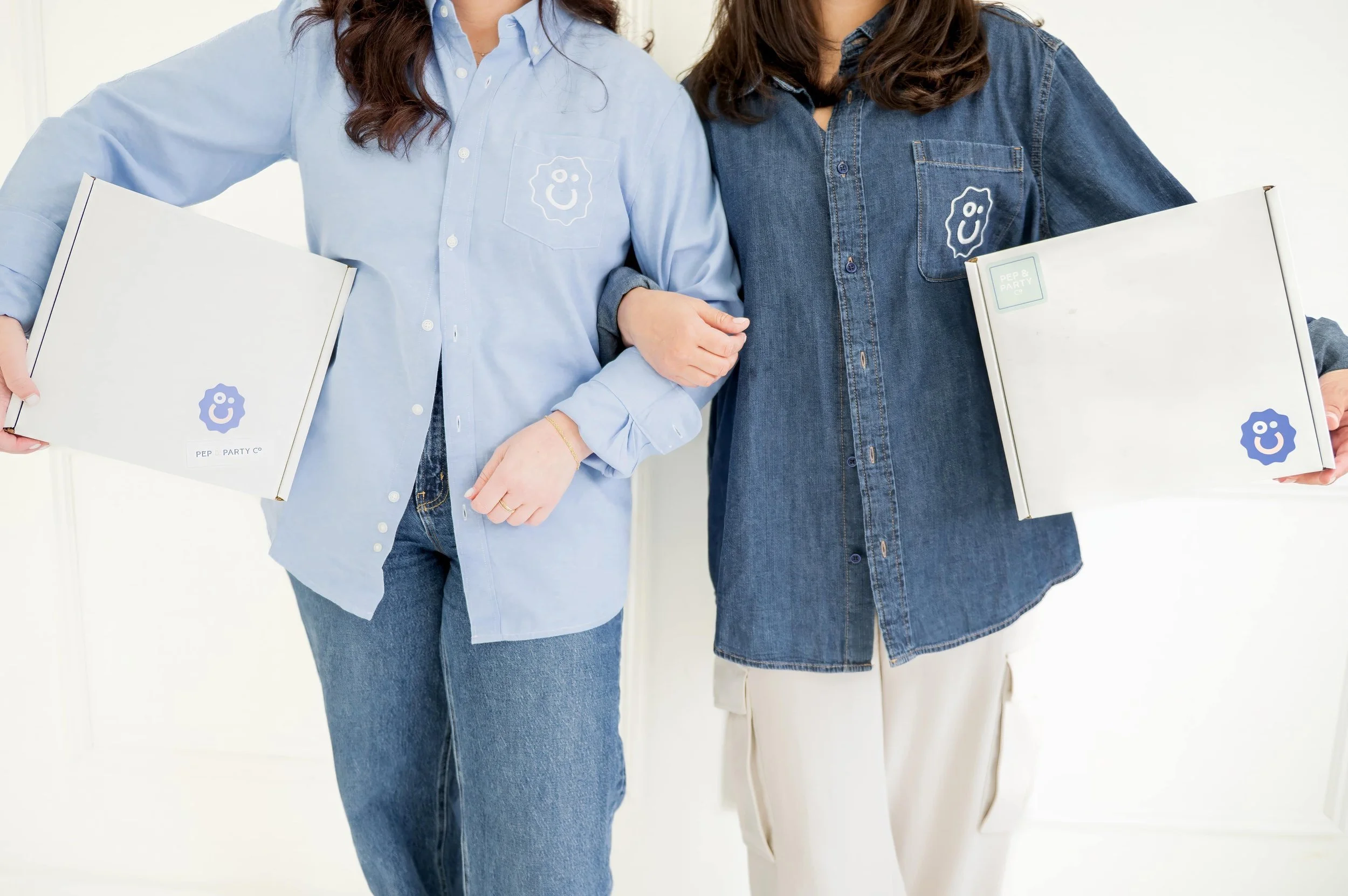 Hand in hand graphic representing meaningful corporate gifting experiences from Pep & Party Co.