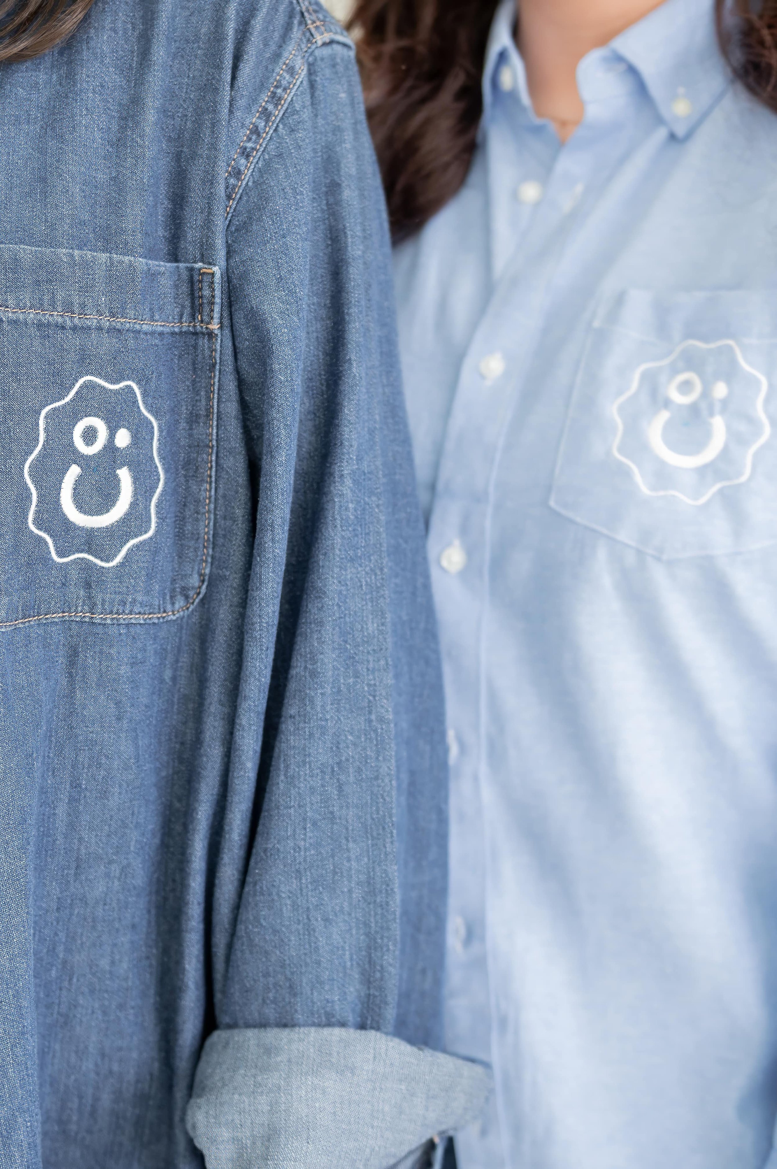 Pep & Party Co. team members wearing denim shirts embroidered with the CoCo logo, representing the gifting studio team.