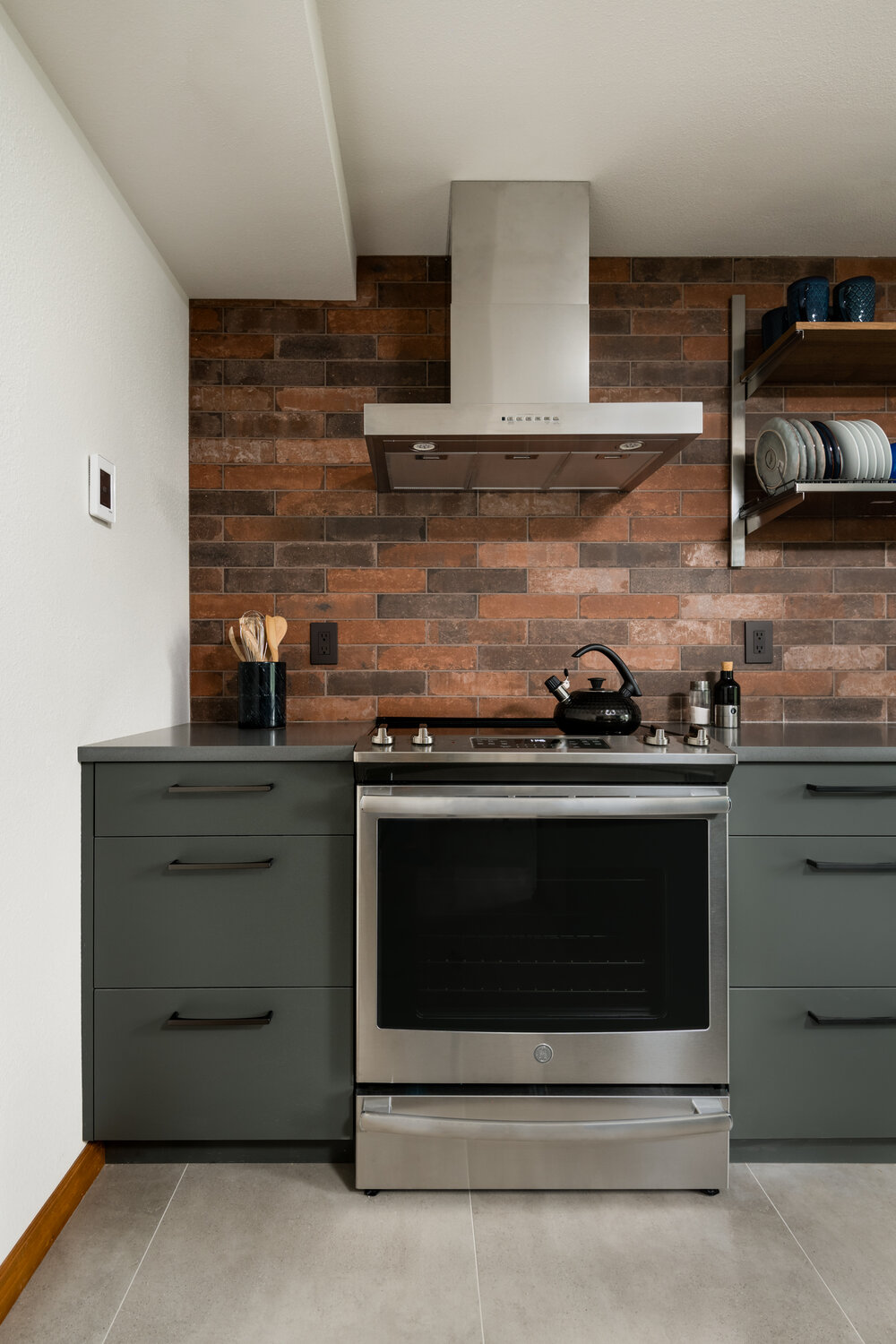 modern kitchen with brick backsplash