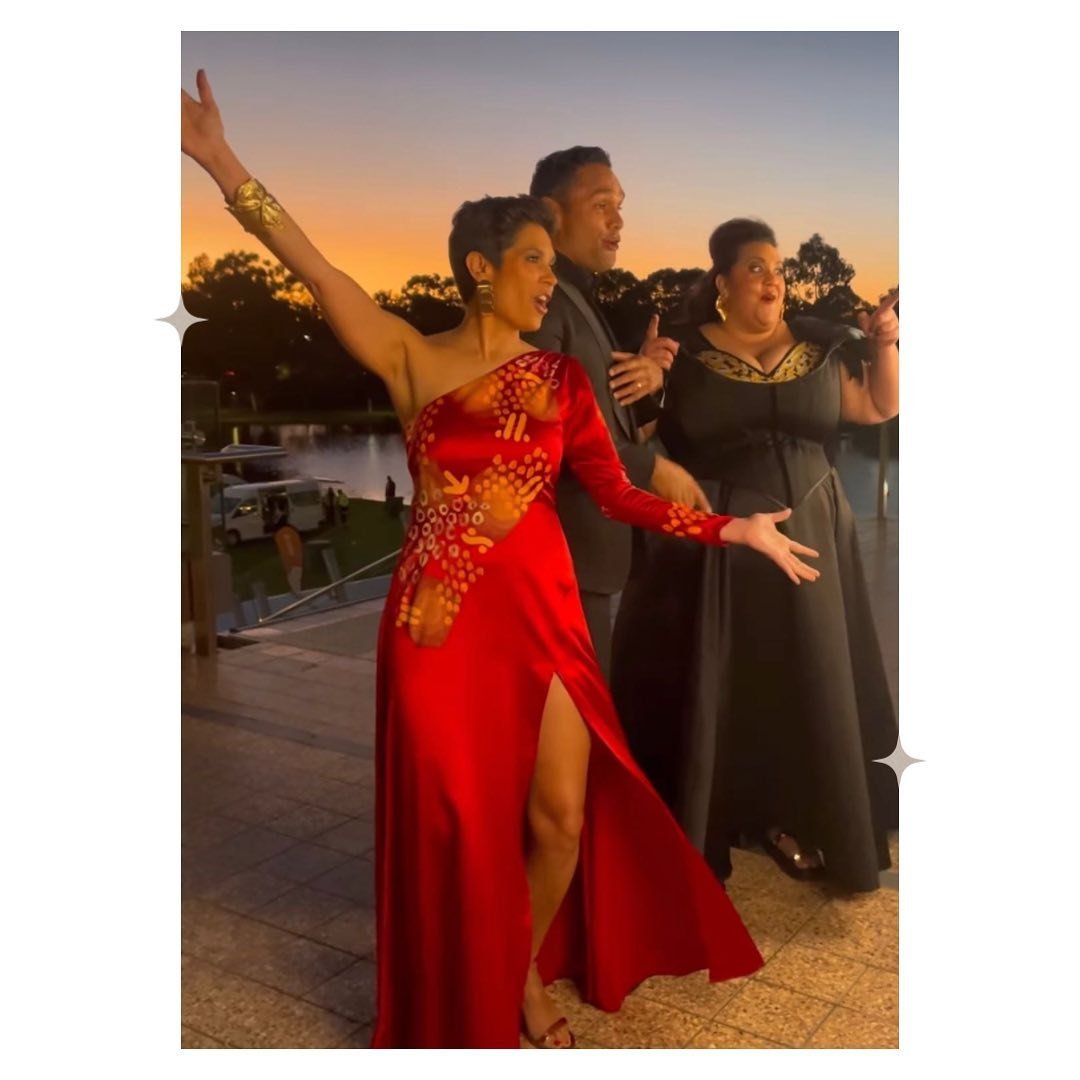 Bespoke silk satin gown for Narelda Jacobs, worn at the NAIDOC National Awards ✨
I recently drafted this dress for @kirrkin_ with beautiful artwork hand painted on the dress by @jdpenangke 
.
I saw the process through from design brief, drafting, toi
