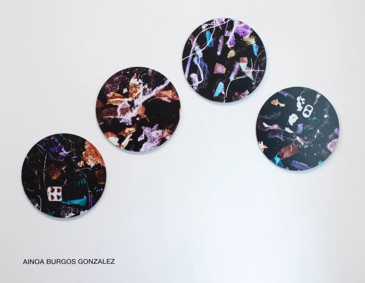 Abstract colorful painting with overlapping shapes and strokes in red, yellow, green, orange, blue, white, and black.