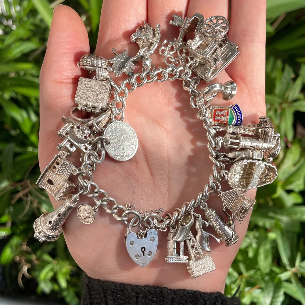 1966 Vintage Sterling Silver Charm Bracelet Padlock Clasp and 24 Charms 80 Grams The Ruby Foxes