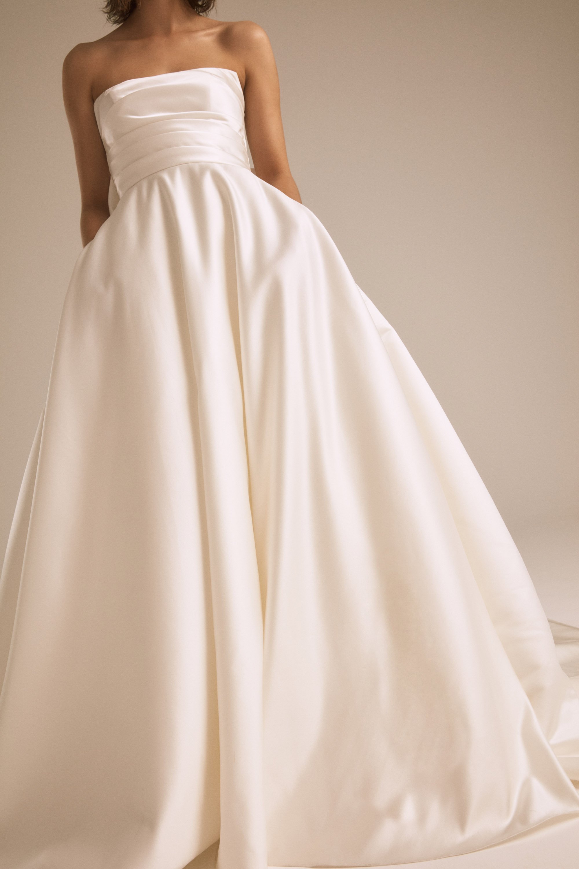 uploads_1657570722482-Nouvelle+Amsale+++Bridal+++ATLAS+++R401S+++Duchess+Satin+++Strapless+++Ruched+++Pockets+++Oversized+Triple+Bow+Detail+++Ballgown+++Mood.jpg