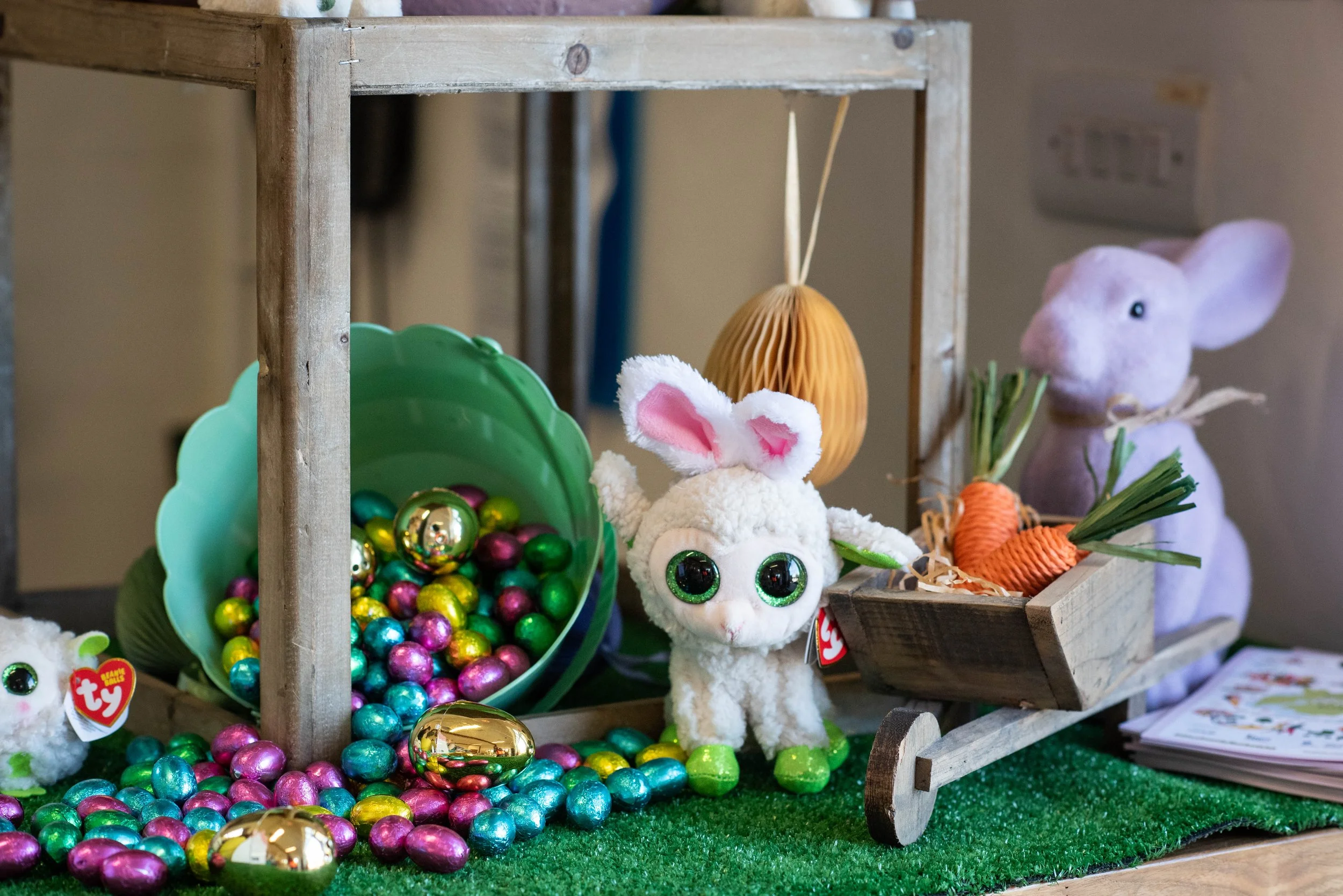 Cattle Country Gift Shop, showing cuddly cows and a watering can