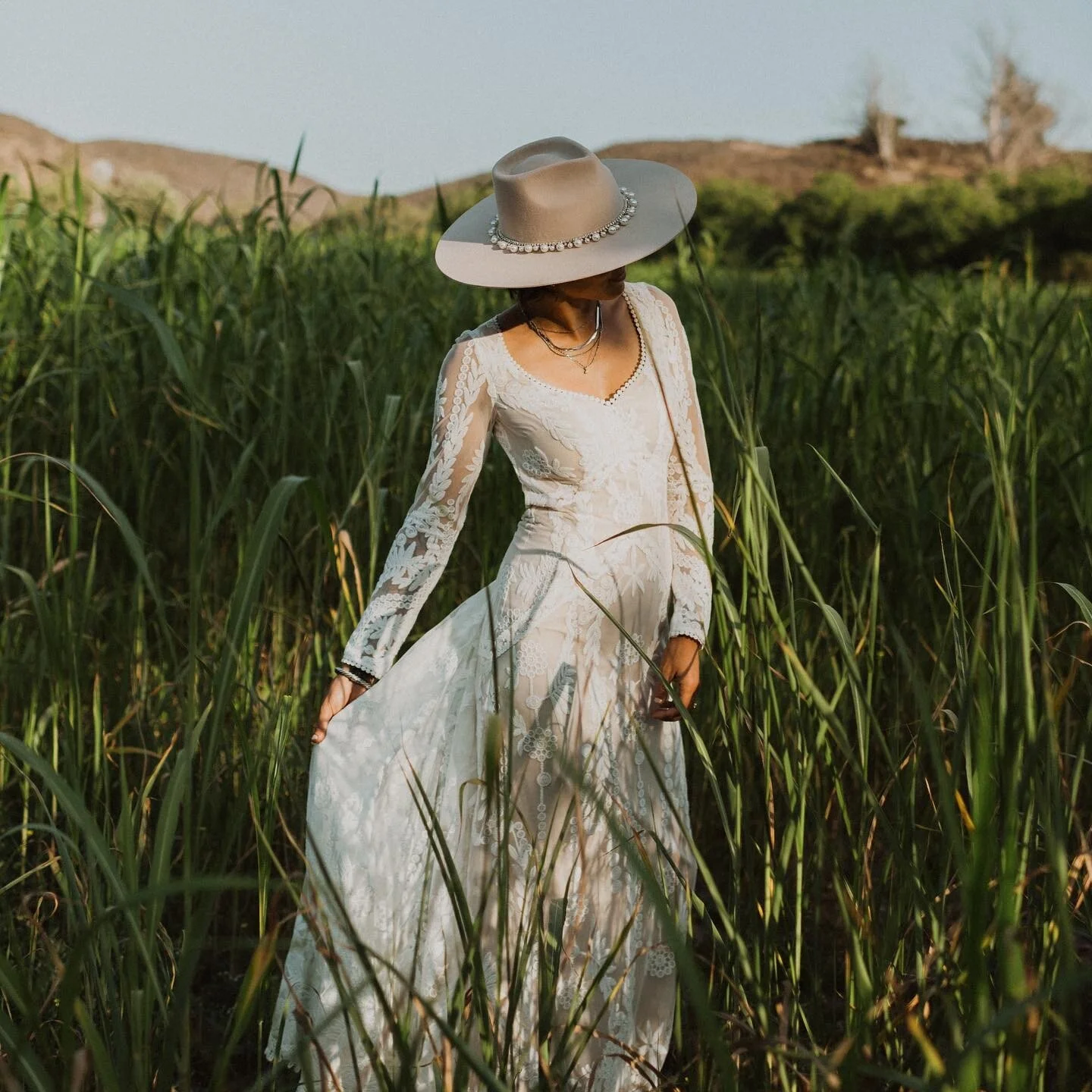 Sudan grass 🌱created a stunning background for photos this summer. #takemeback #wedding #bohowedding #ranchwedding