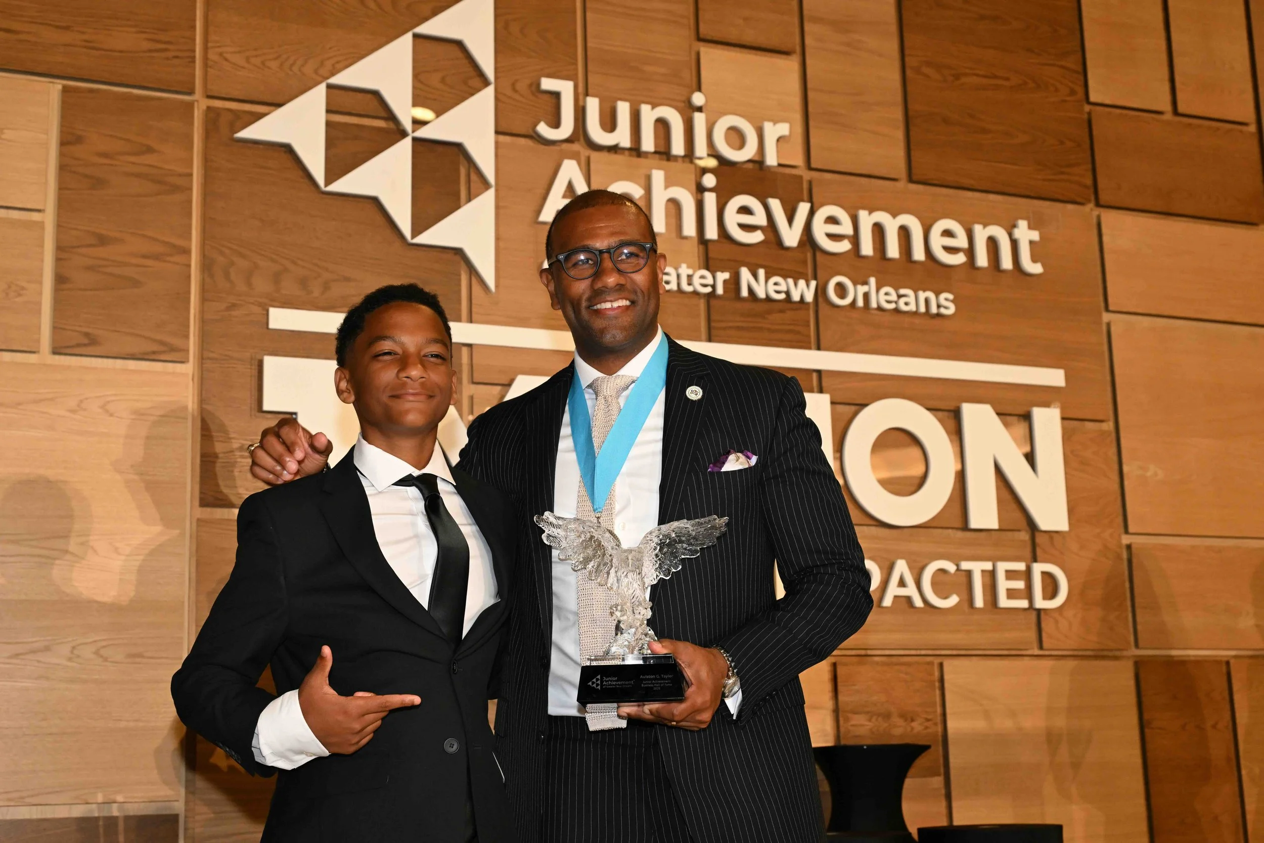 Aulston and student and award.jpeg