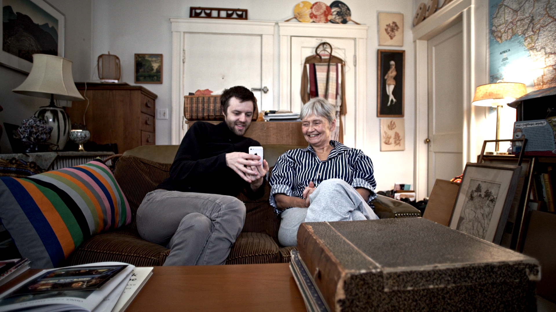 Sarah and Ryan on couch smiling.png