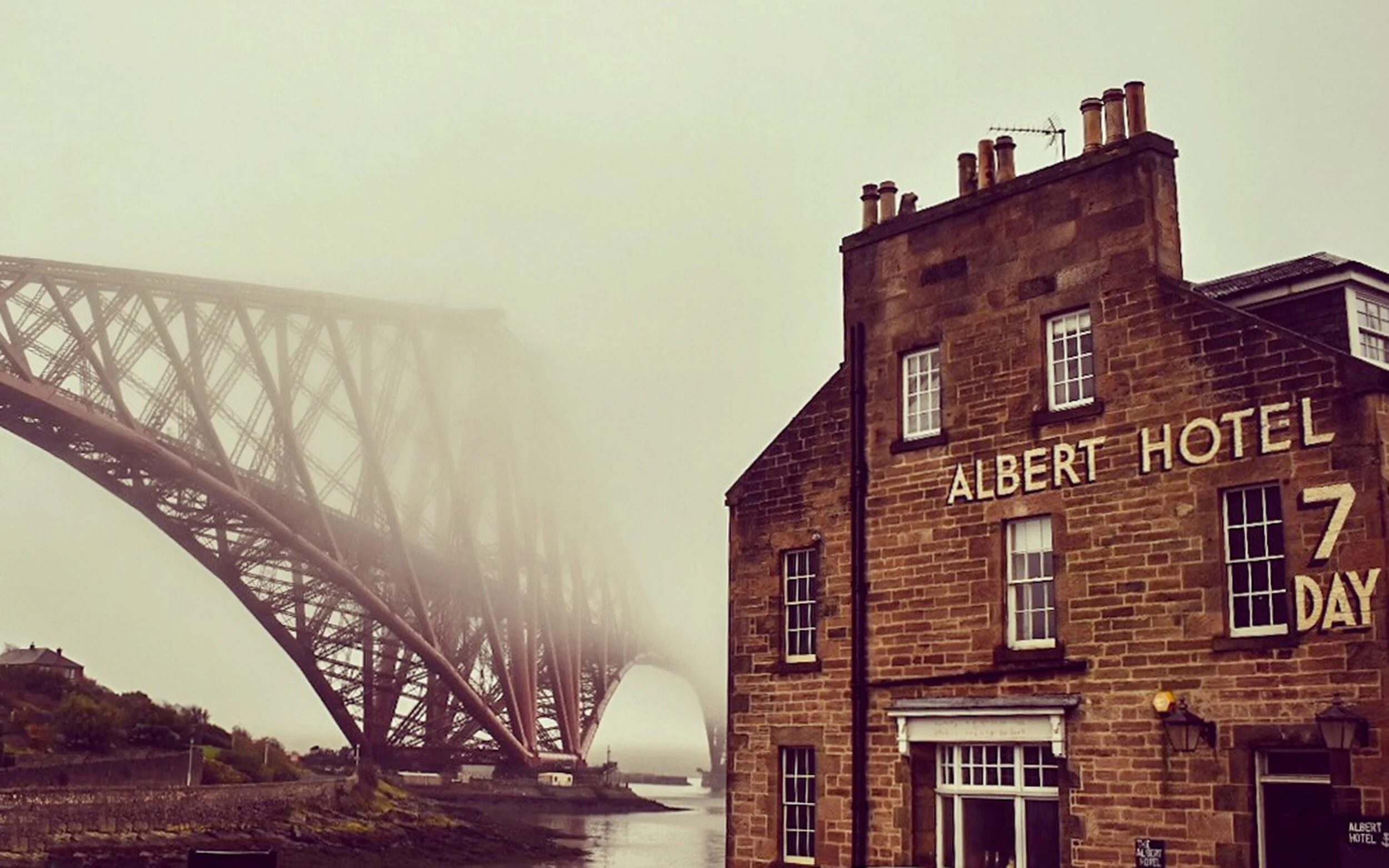 Award winning image of Forth Rail Bridge and The Albert Hotel in Scotland in the fog.  Brown earthy tones.  Runner up SLPOTY Urban photography image Print