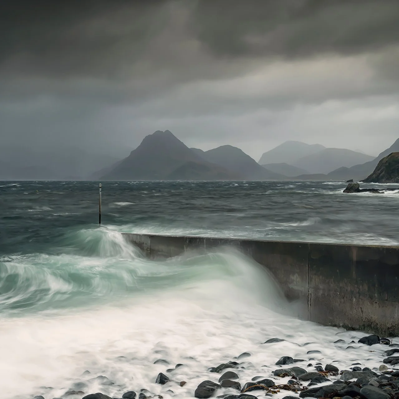 A stormy seacsape photography print from Elgol Beach on The Isle of Skye Scotland with The Cuillin Mountains