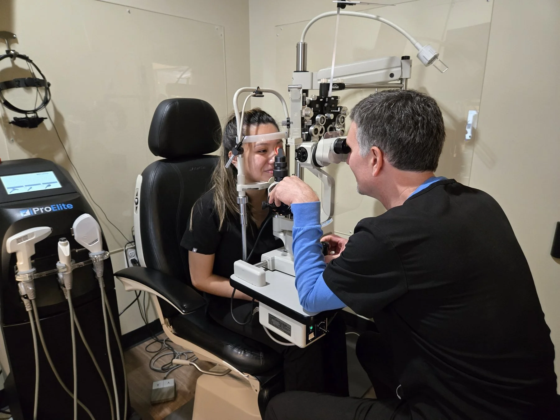 Doctor reviewing dry eye findings with a patient during a focused eye evaluation