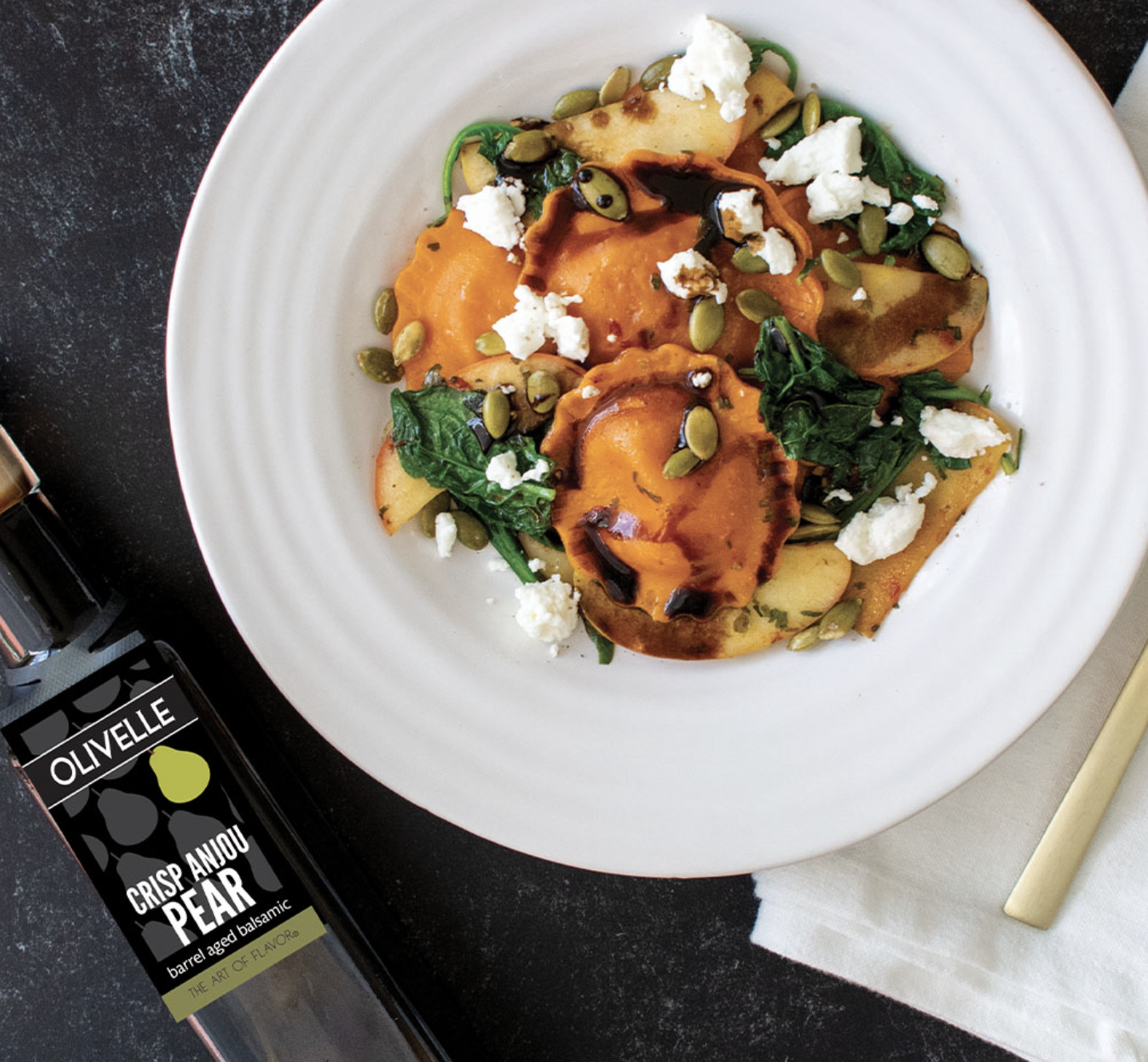 Squash Ravioli with Sautéed Apples and a Pear Balsamic Drizzle