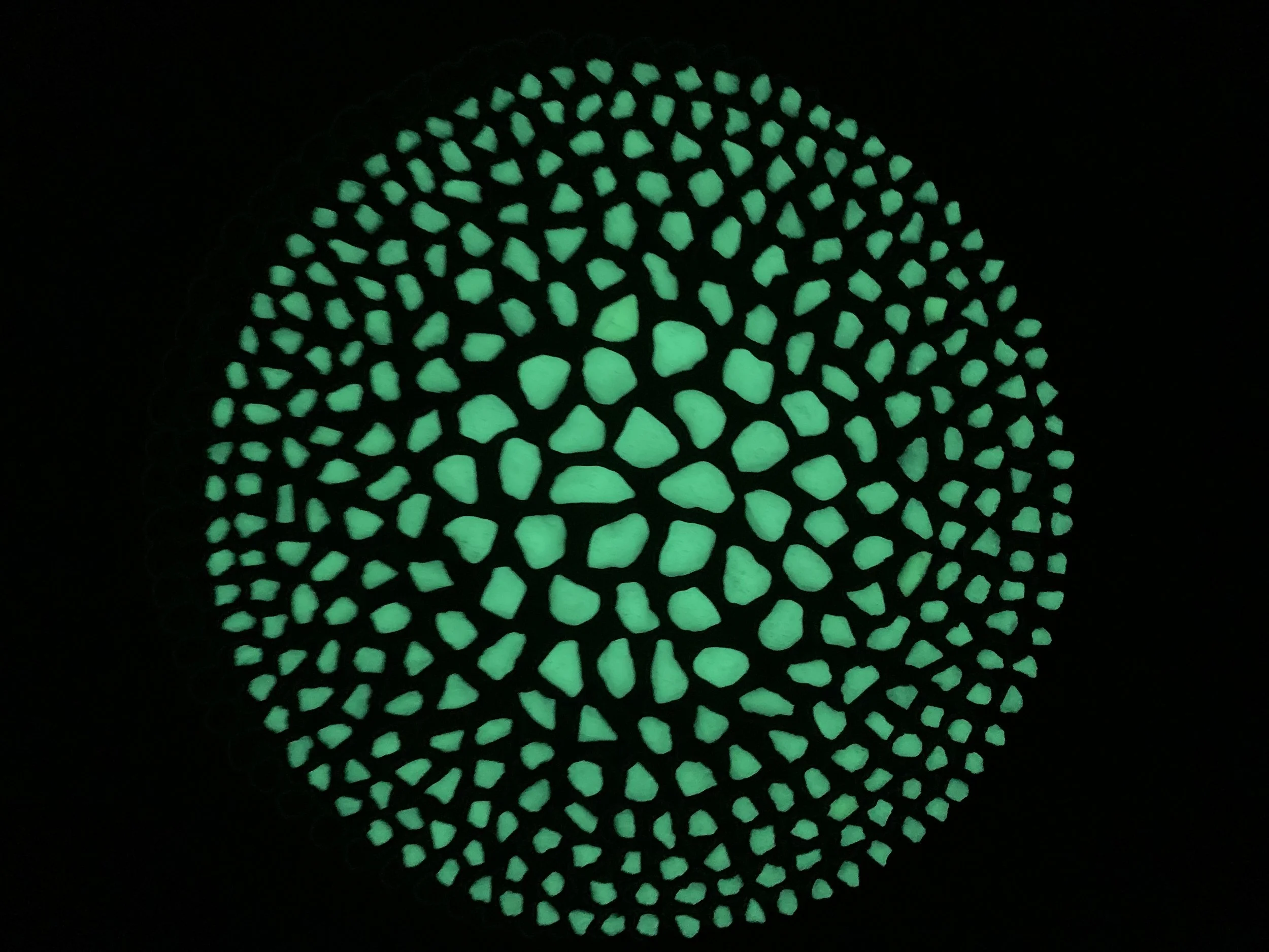 Phosphorescent Moon Rocks, Stones, detail, nighttime view, 
Phosphorescent rocks on cardboard, glue, 20” x 20”, 2025, $1050