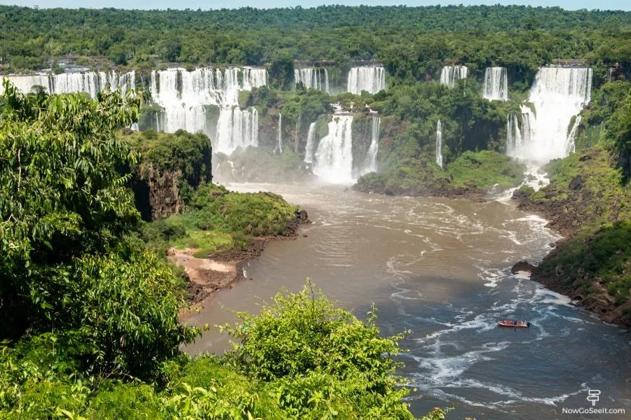 Visiting The Brazil Side of Iguazu Falls: Route, Tips & More Panoramic view with boats closer