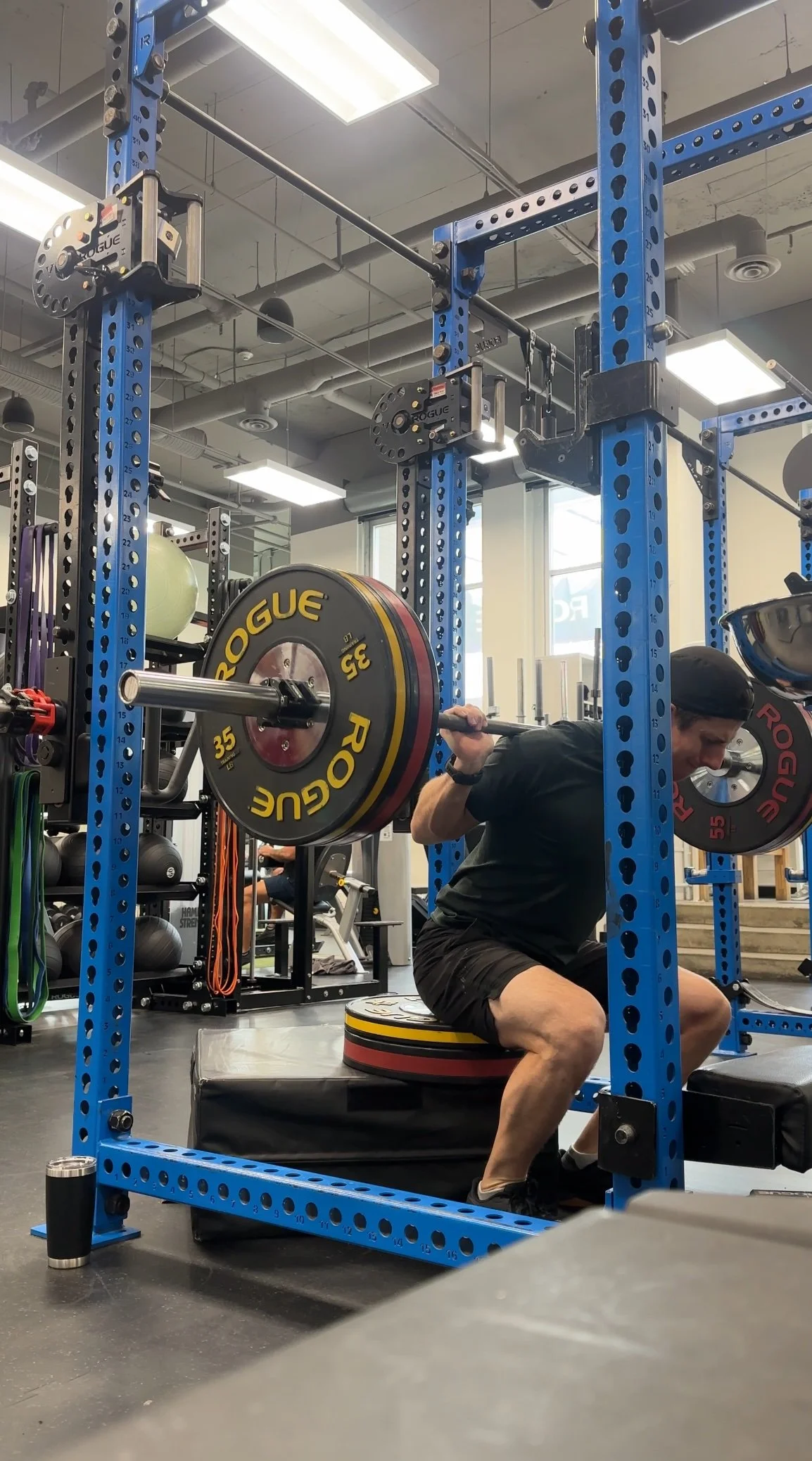 a man doing a squat rack squat during personal training in kitsilano vancouver.