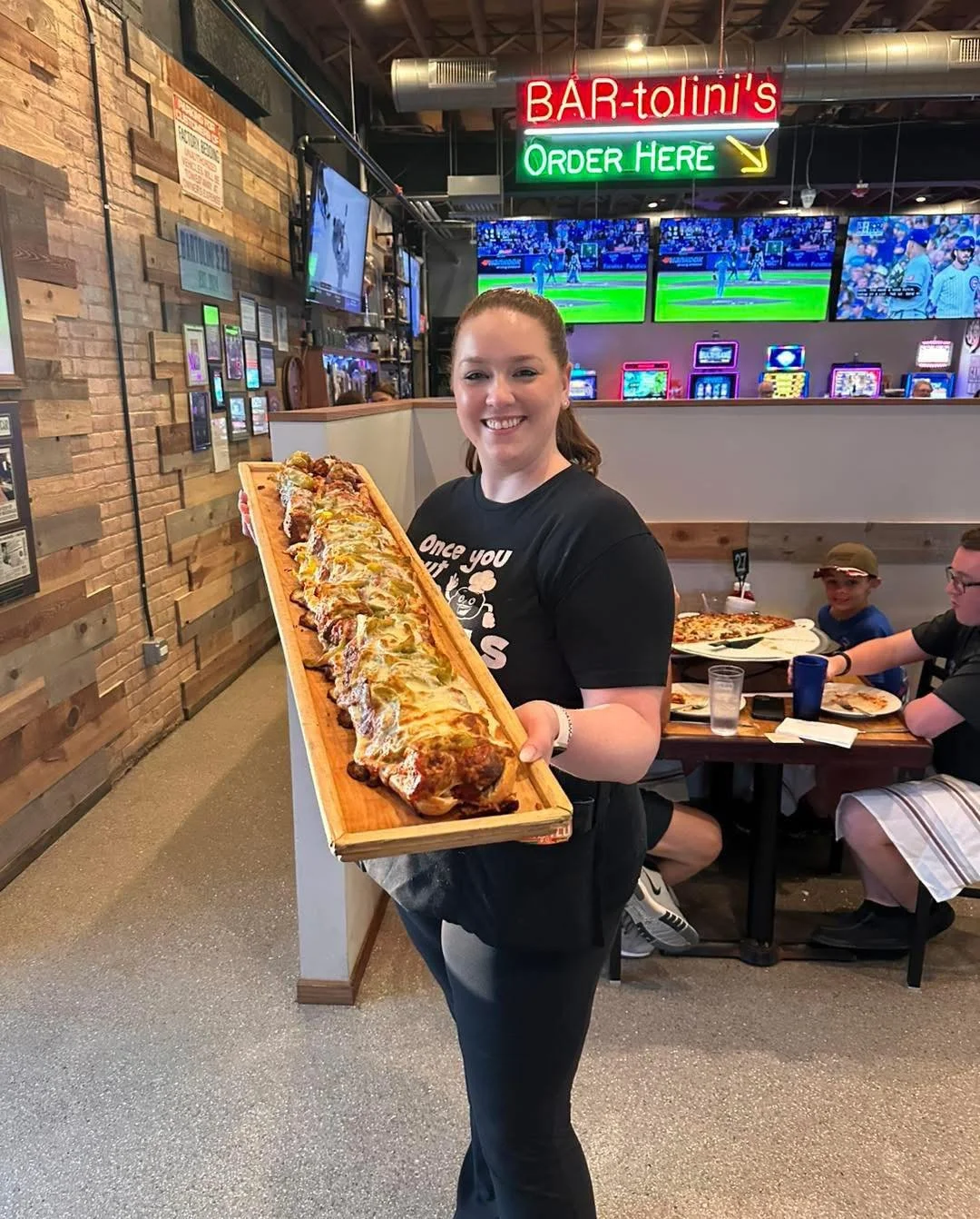 🚨 SUPER BOWL MVP ALERT! 
BARTOLINI&rsquo;S 10 lb &bull; 3 FOOT MEATBALL SANDWICH

40 famous meatballs.
Melted mozzarella.
Rich red gravy.
Roasted peppers.
3 feet of pure crowd-pleasing perfection.

The ultimate Super Bowl centerpiece &mdash; and YES