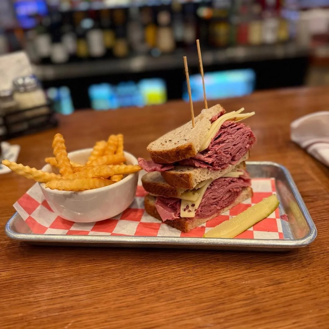 Hot. Hearty. Classic.
Our Warm Corned Beef Sandwich is piled high and served with your choice of crinkle-cut fries, homemade chips, or slaw.