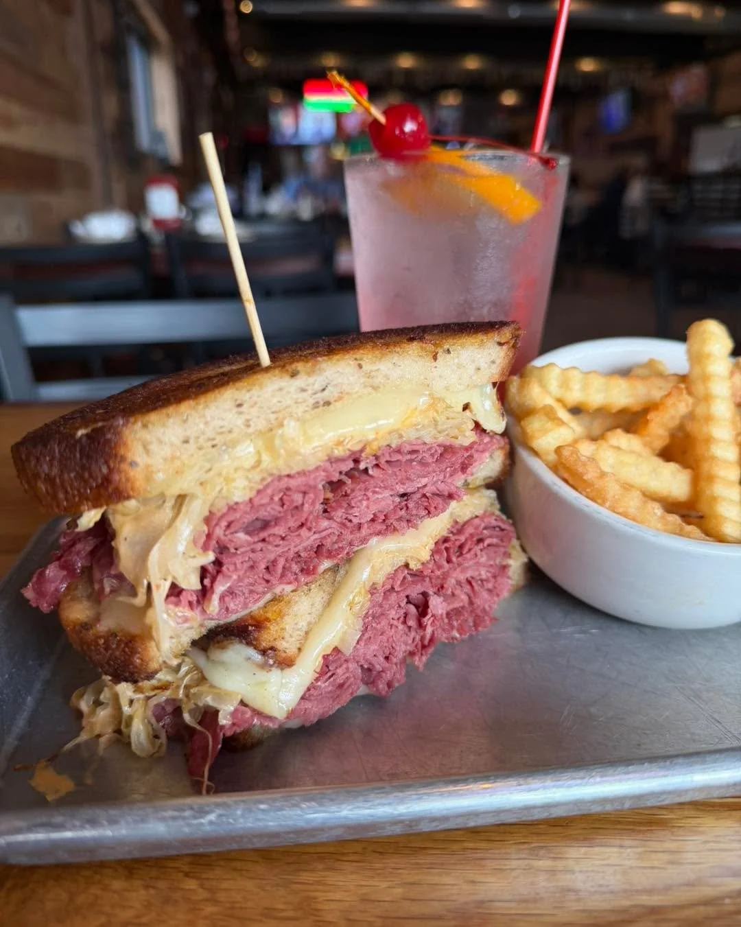 Looking for lunch? 
  Need dinner plans?

Our Reuben Sandwich is 
  calling your name.

Piled high on toasted rye with tender corned beef, swiss cheese, sauerkraut, and 1,000 Island dressing.

Served with your choice of:
&bull; Crinkle-Cut Fries
&bul