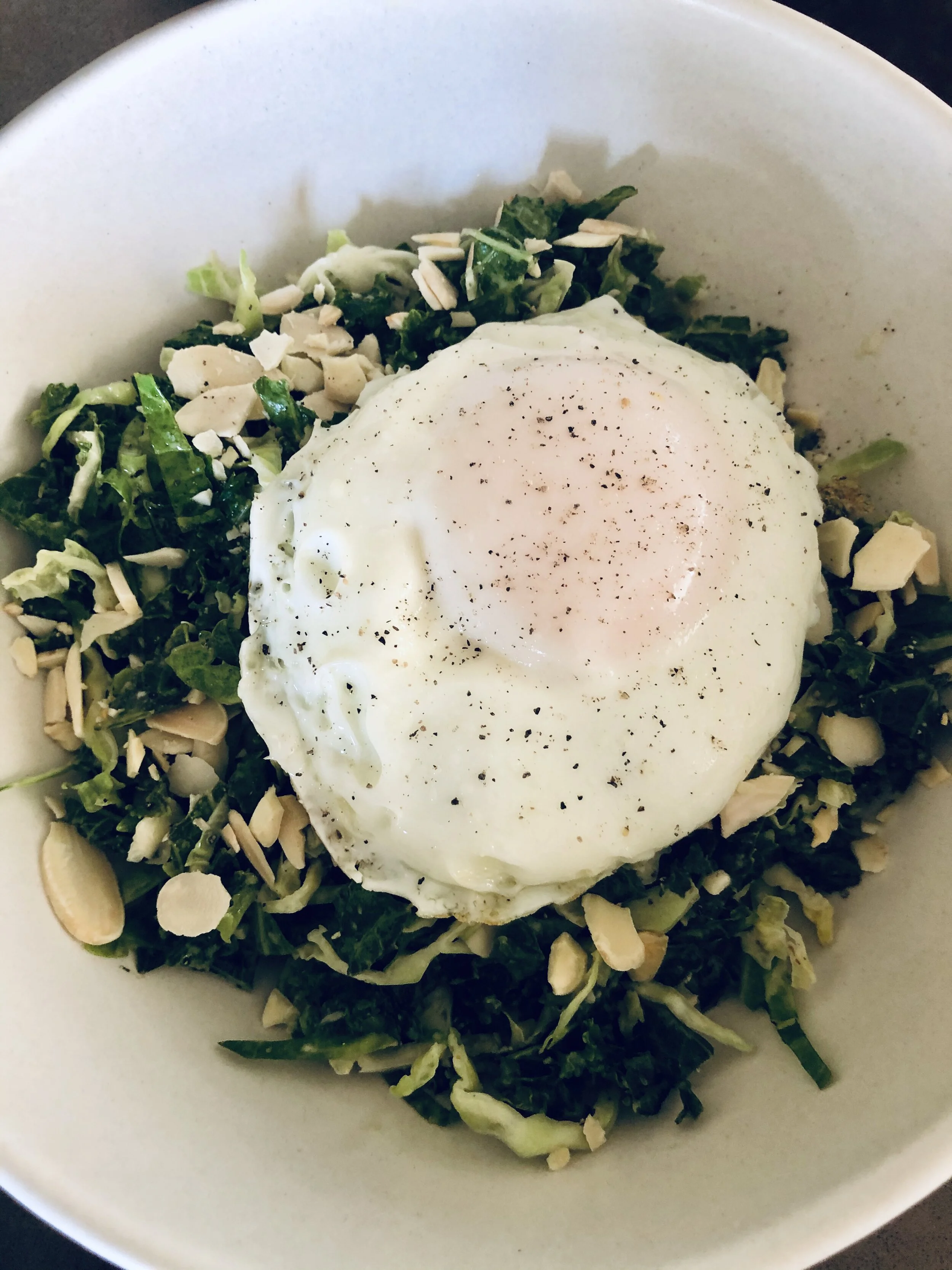 Summer Solstice Shredded Brussel Sprouts, Kale, and Poached Egg Salad