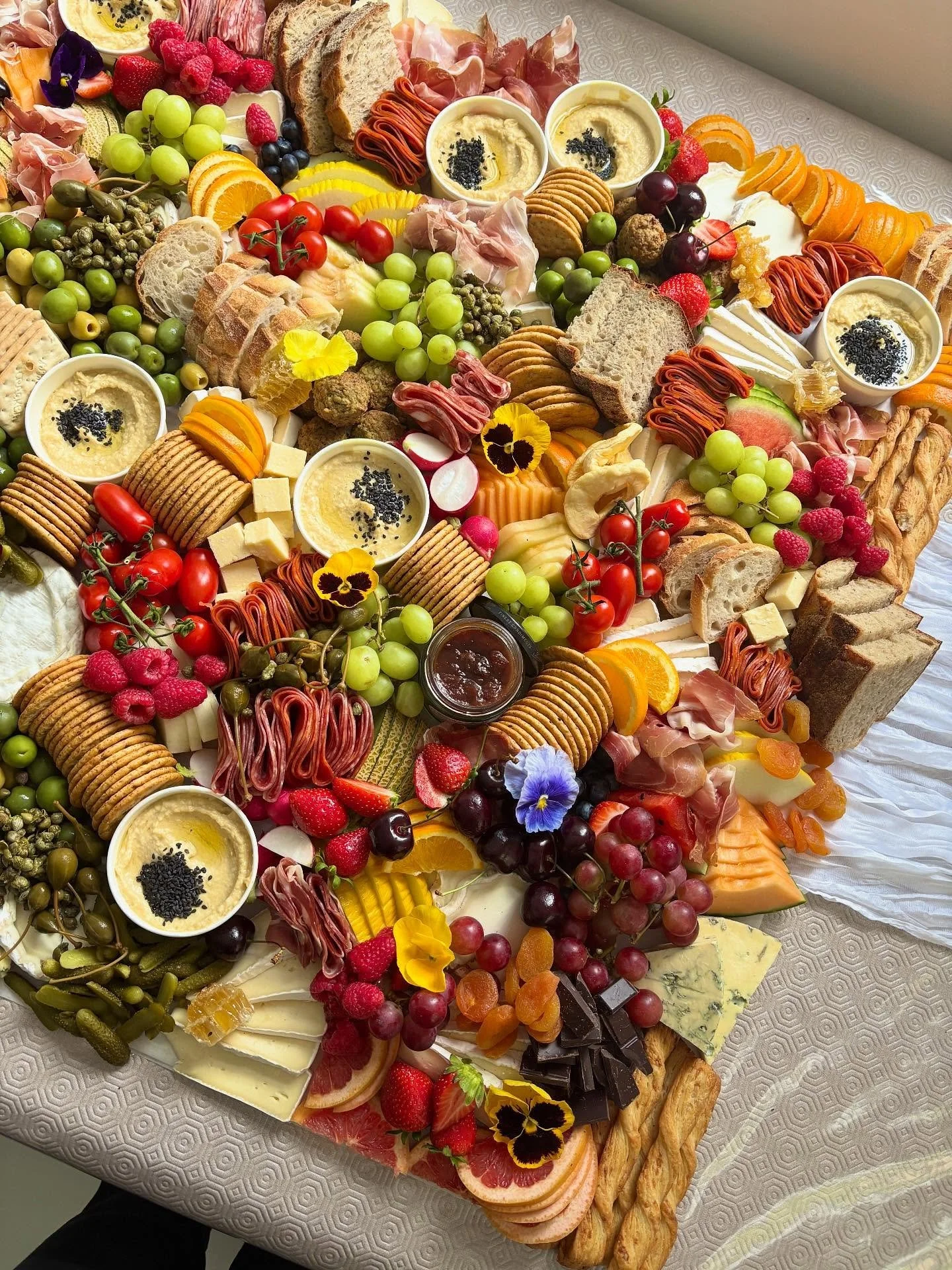 A gorgeous bespoke grazing table for T&rsquo;s bridal shower 💖