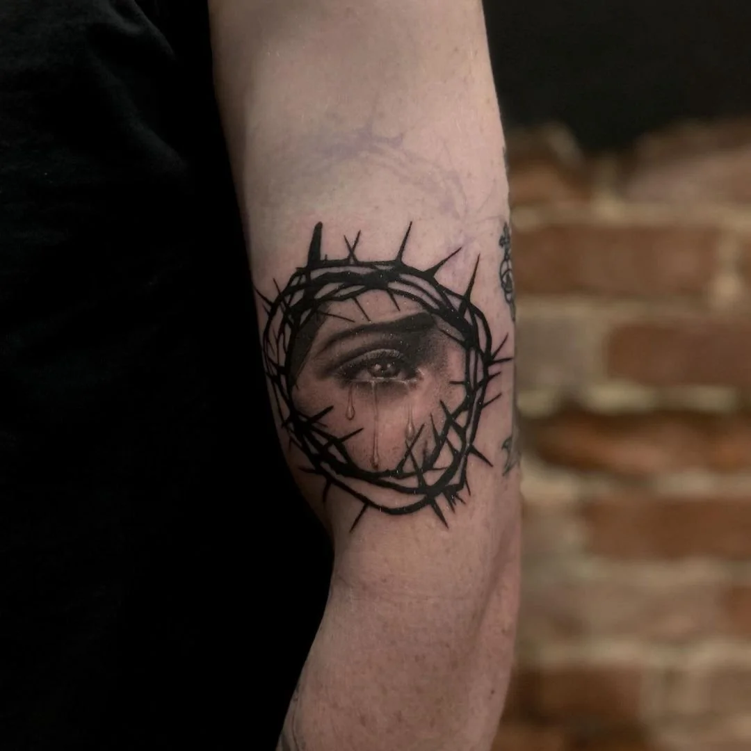 eye-thorns-tattoo