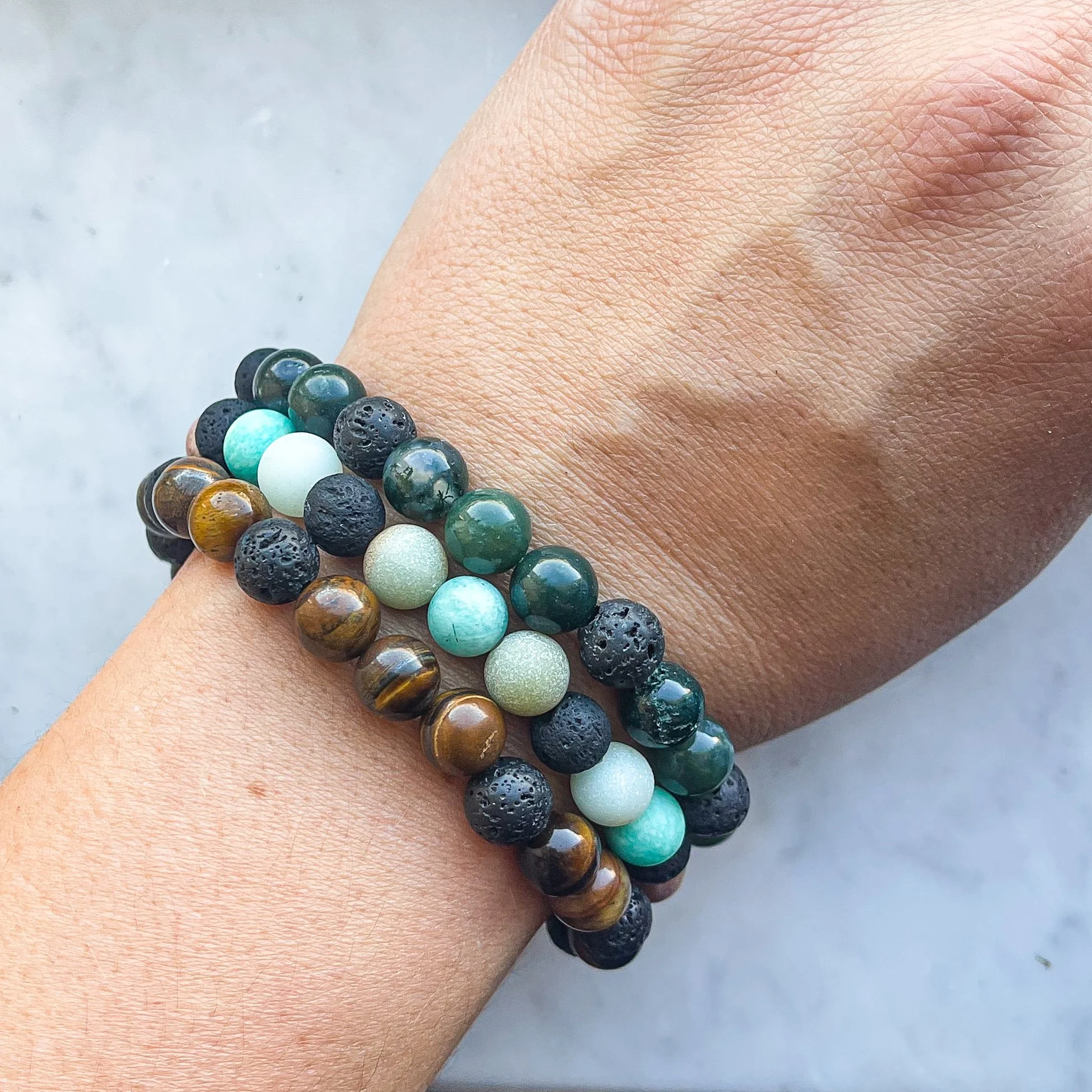 Gemstone aromatherapy Bracelets stack lifestyle.JPG