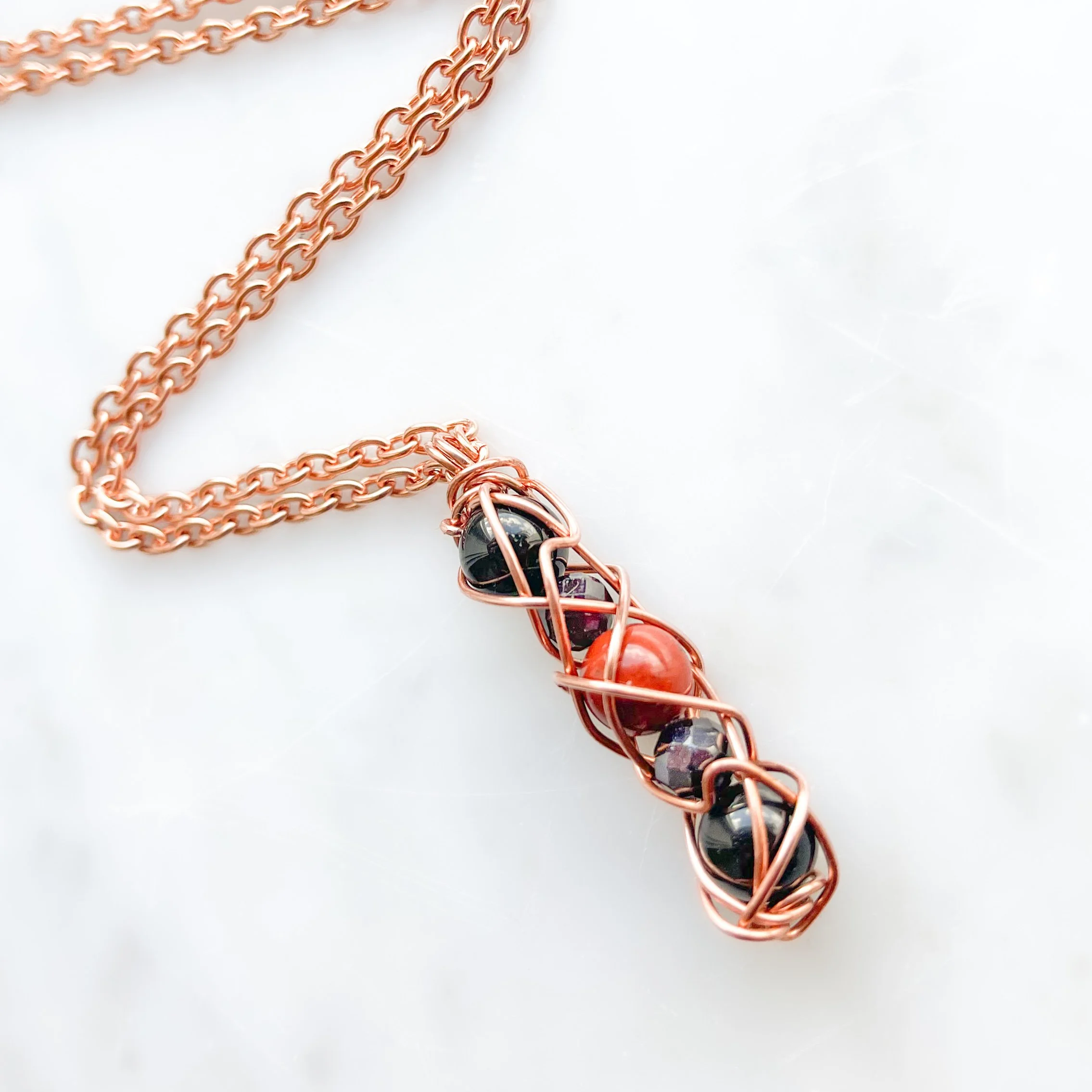 Root Chakra Spiral Necklace in Copper.JPG