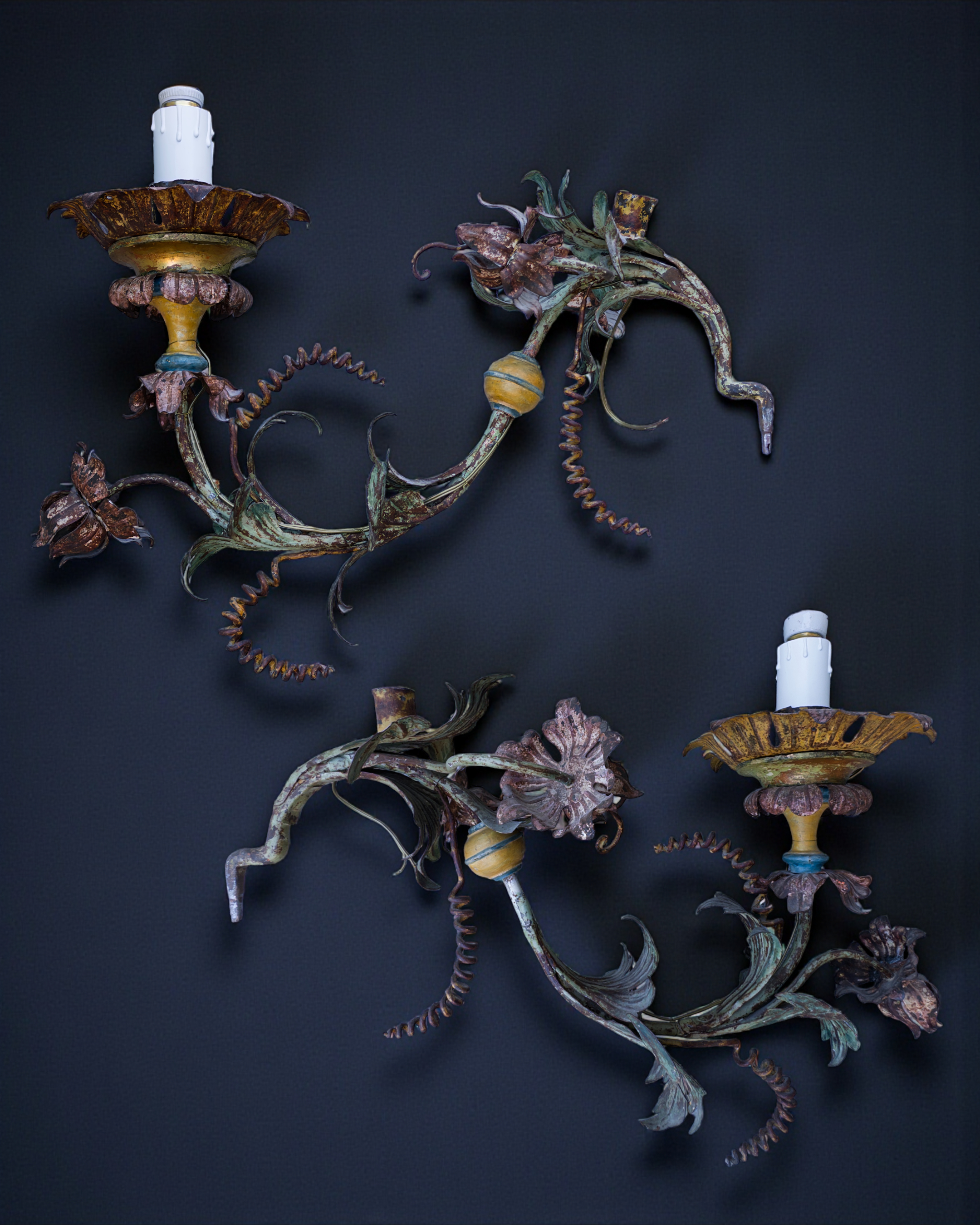 A pair of polychrome iron arms torcheres1.PNG