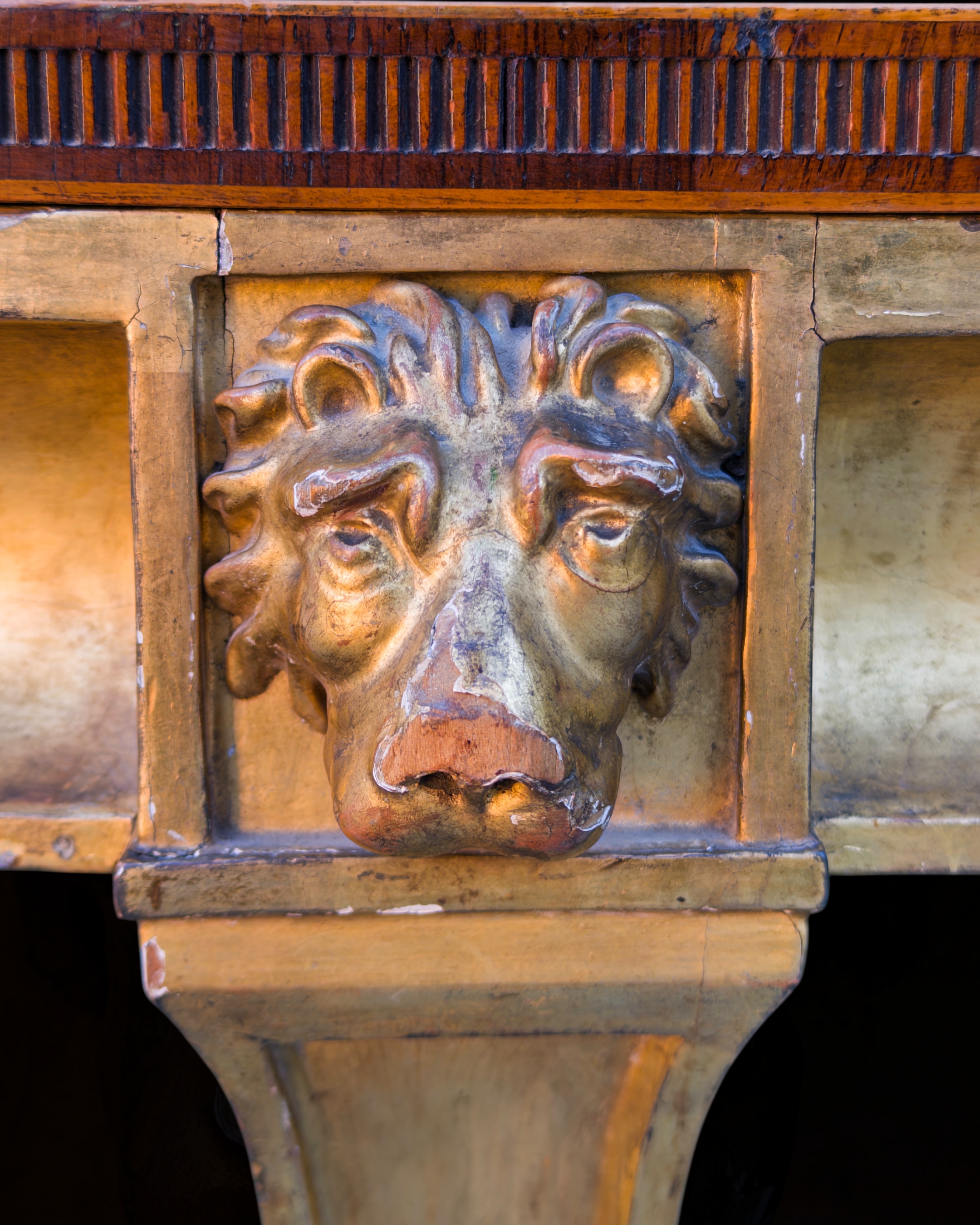 A fine Sheraton carved and gilded consolle table with a top venereed in rosewood and satinwood6.PNG
