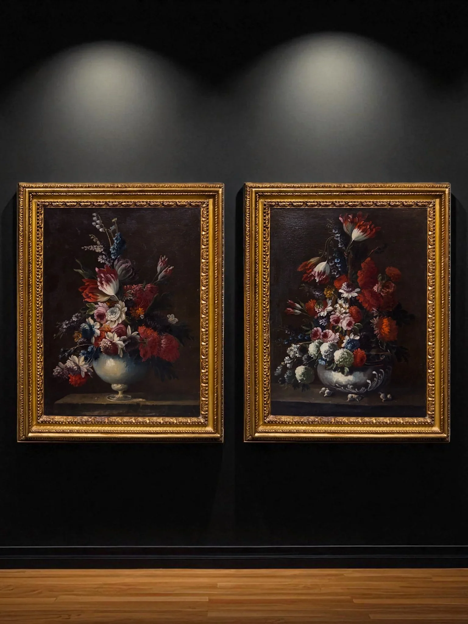 SOLD: A pair of still life with flowers in a basket