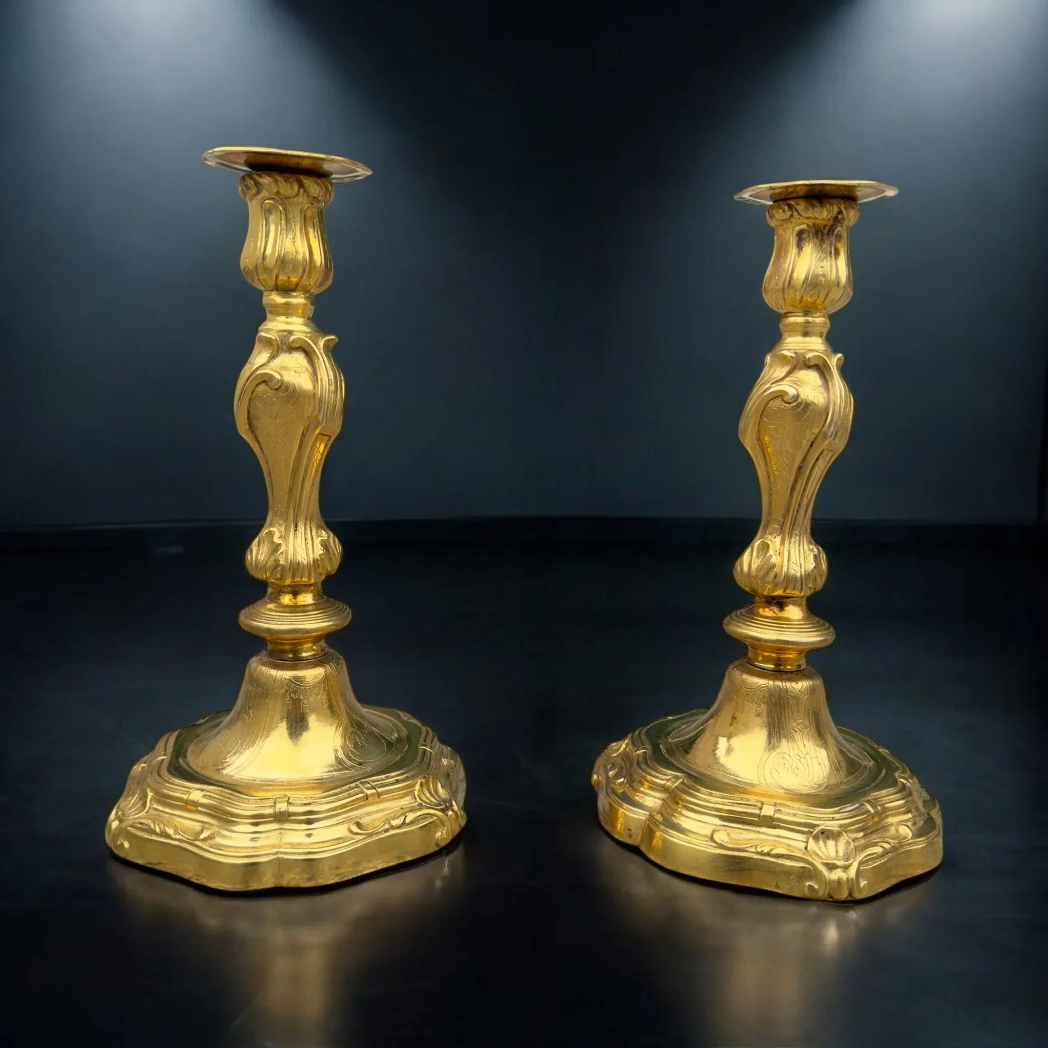 SOLD: A pair of LXV style gilded and finely chiseled bronze candlesticks